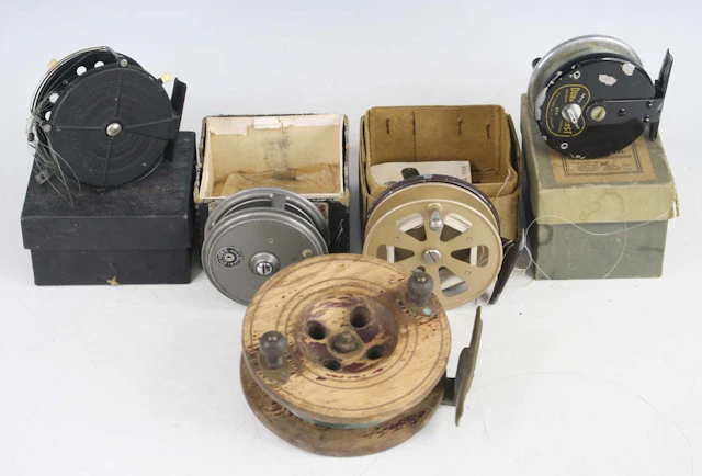 Lot 1336 - A collection of five fishing reels to