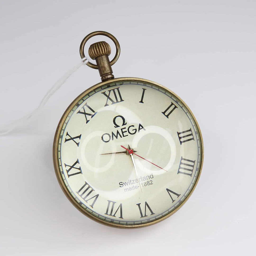 Lot 212 - A reproduction perspex and brass desk clock