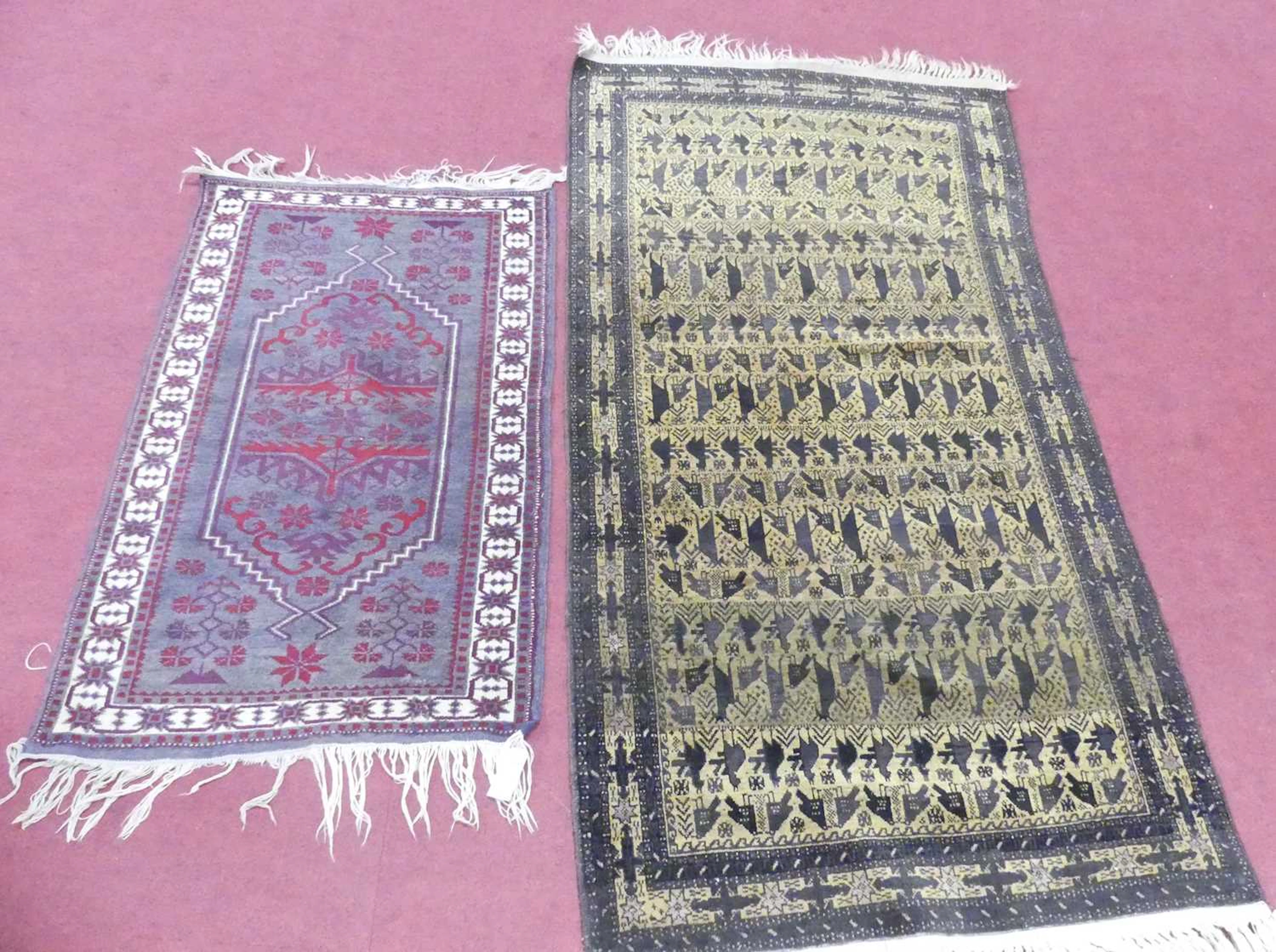Lot 755 - An Afghan woollen deep ground rug, with flat