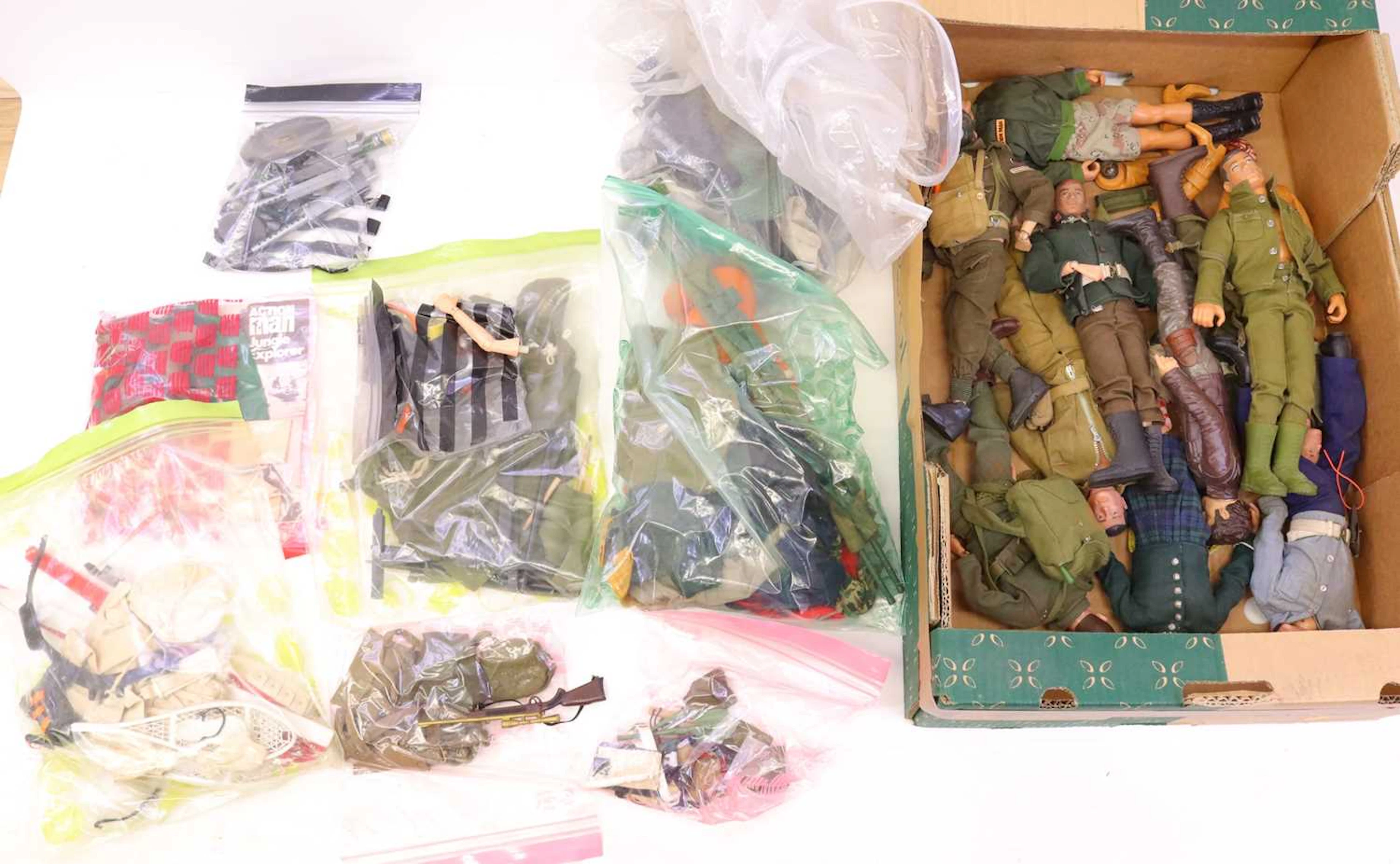 Lot 301 - Two trays containing various Action Man