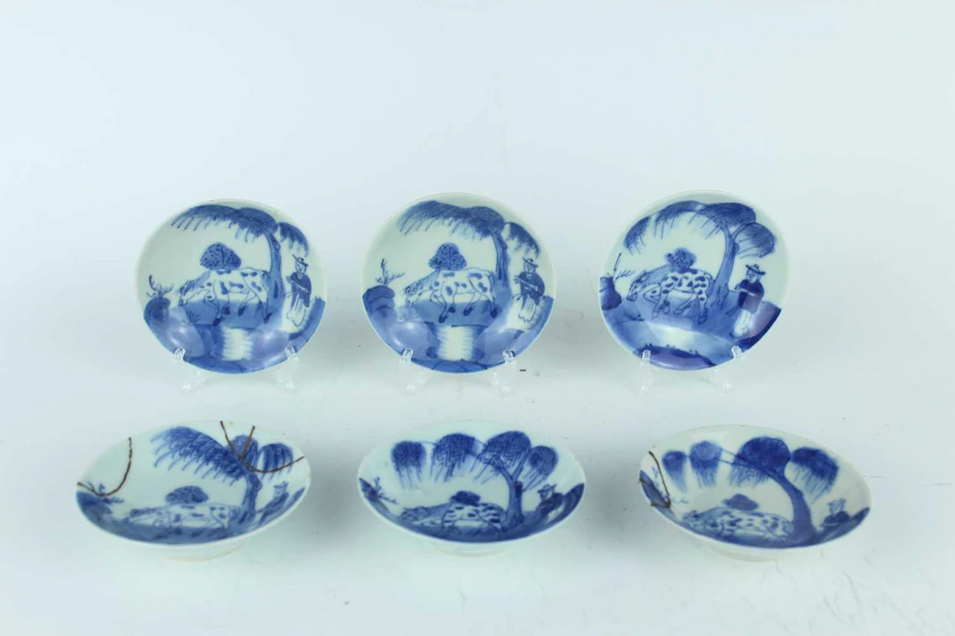 Lot 107 - A set of six Chinese blue and white ‘man and