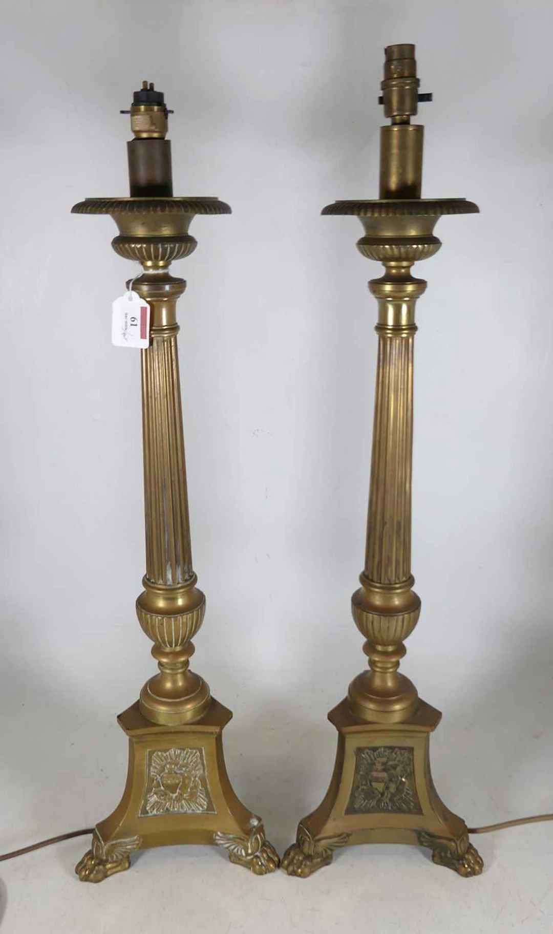 Lot 61 - A pair of brass table lamps, 20th century, in