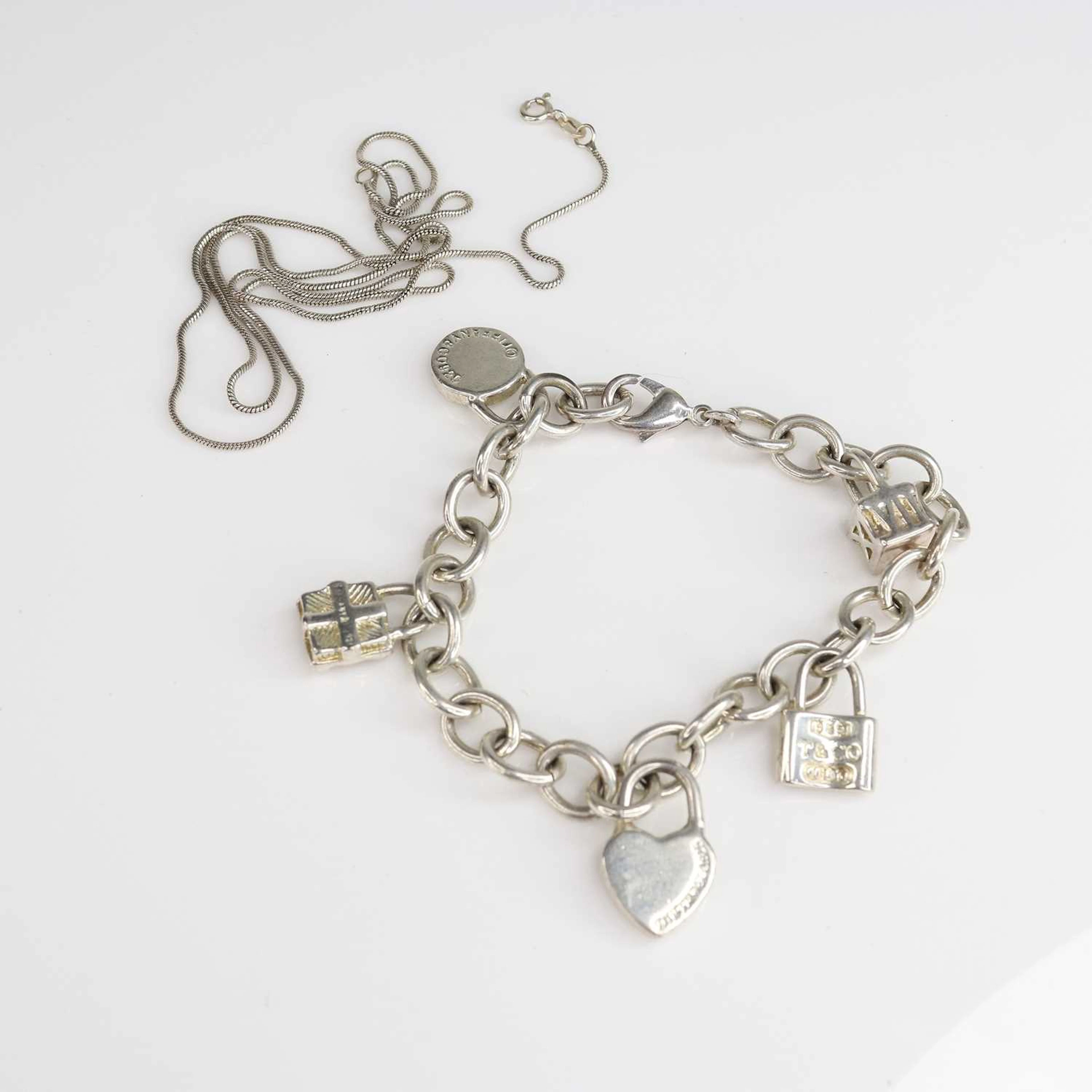 Lot 213 - A Tiffany & Co. silver bracelet with padlock