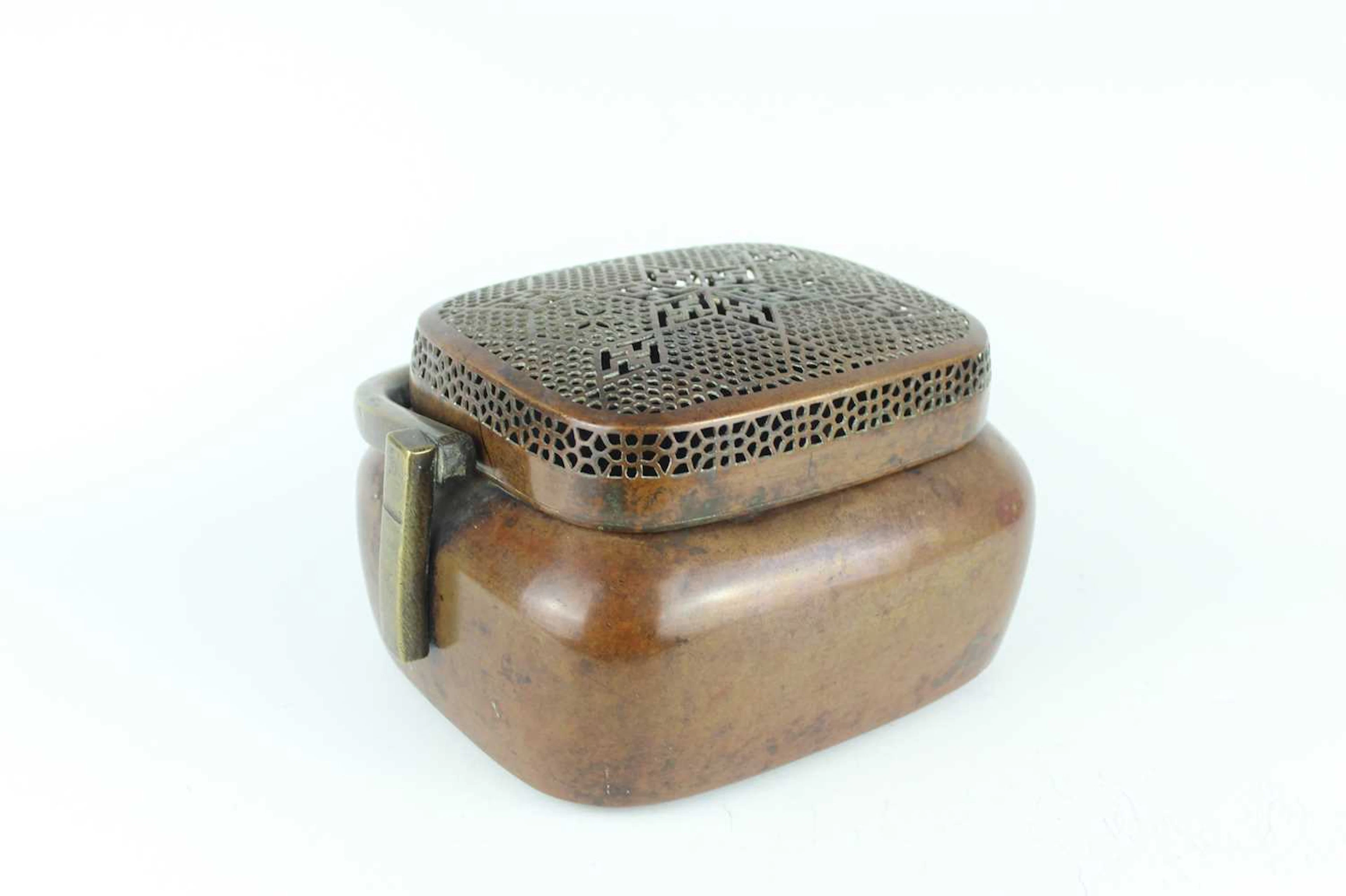 Lot 35 - A large Chinese bronze hand warmer with