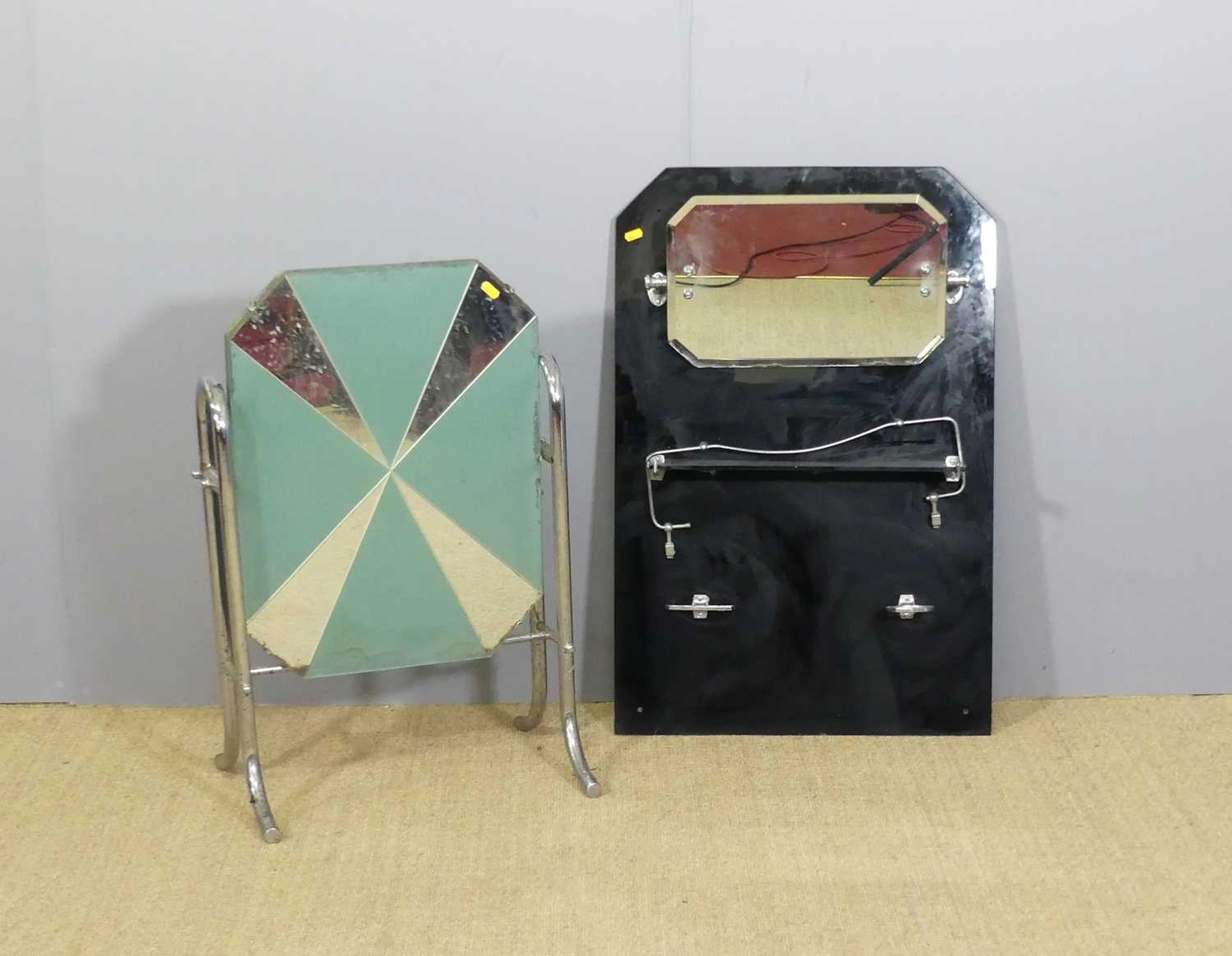 Lot 582 - An Art Deco black mirrored glass and chrome
