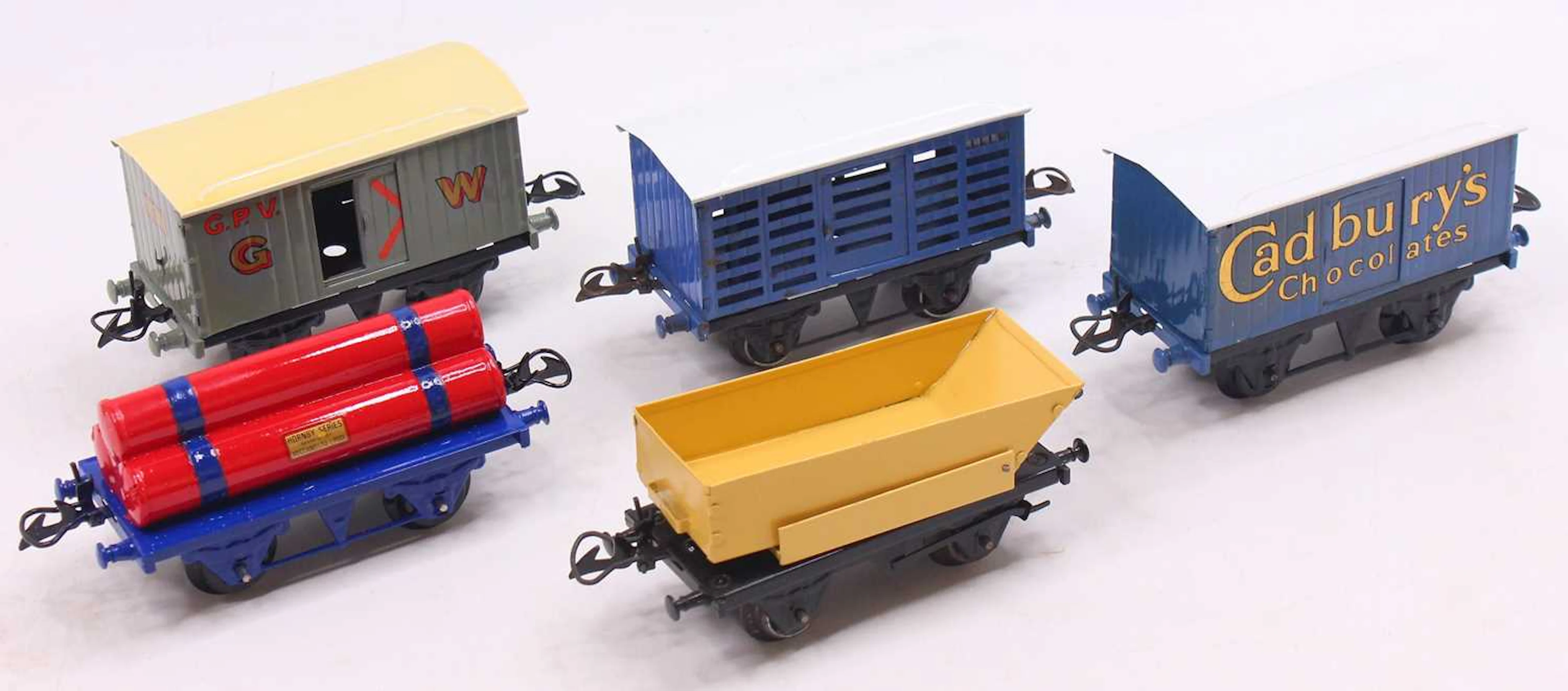 Lot 136 - Five repainted Hornby 0-gauge goods wagons: