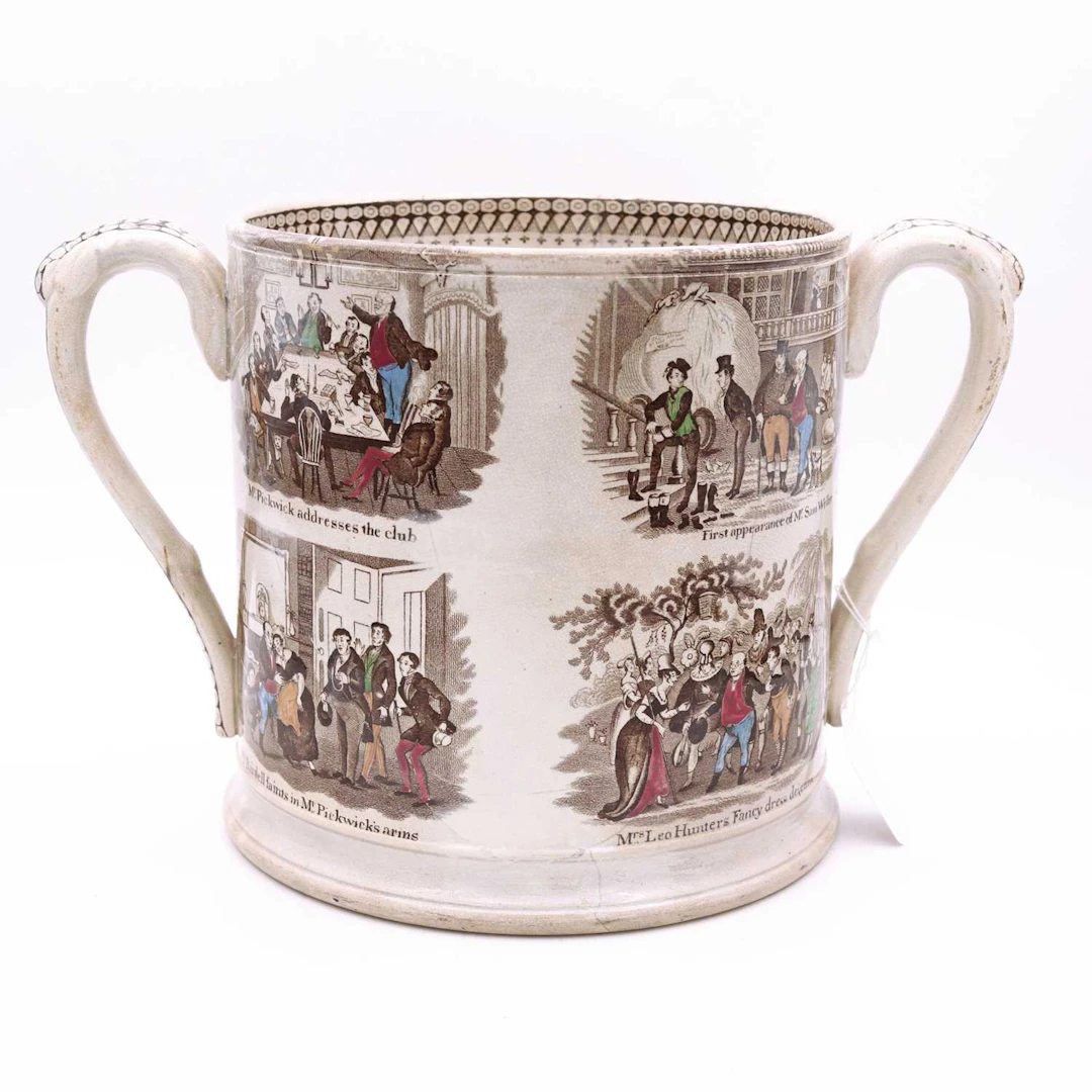 Lot 18 - A mid-19th century Staffordshire loving cup