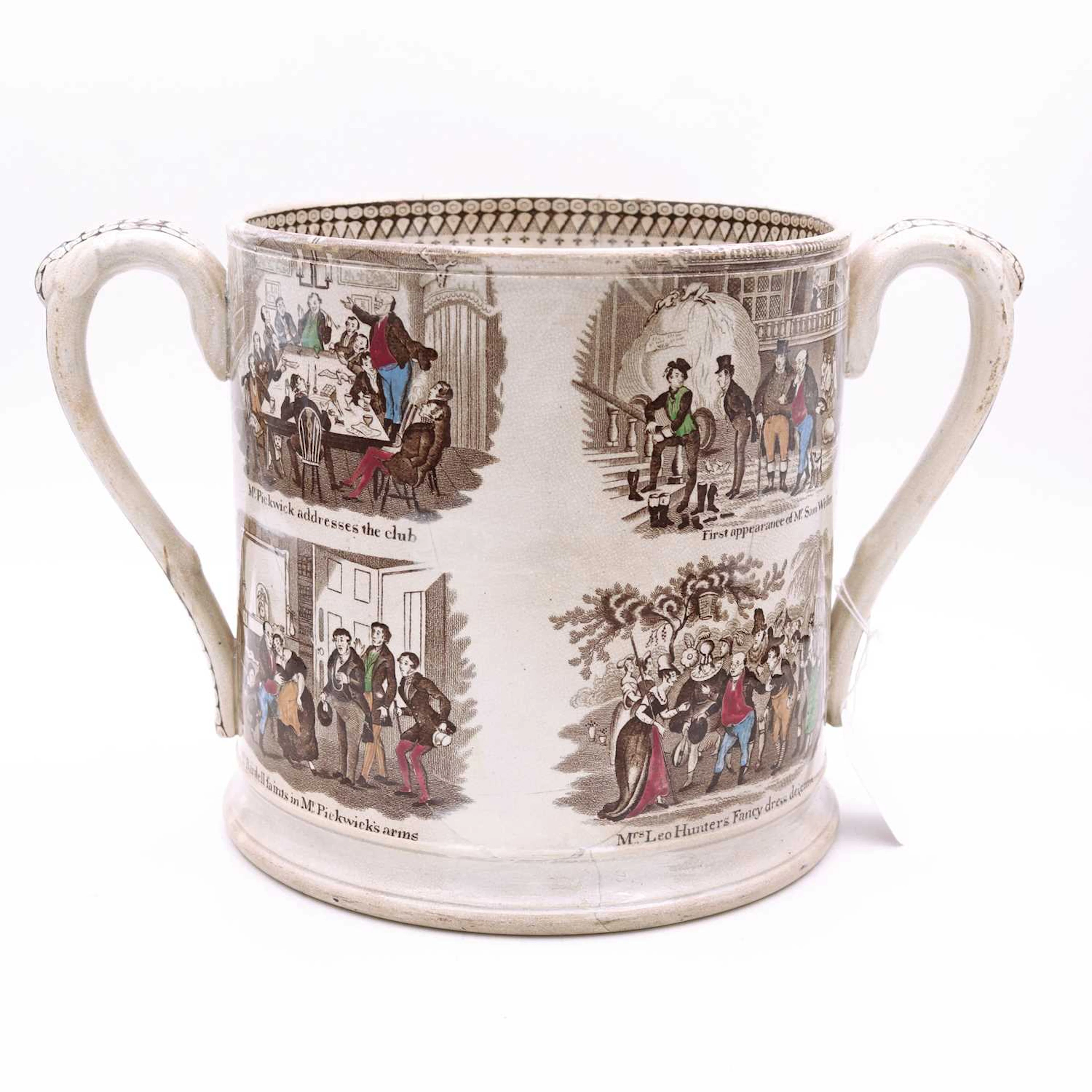 Lot 18 - A mid-19th century Staffordshire loving cup