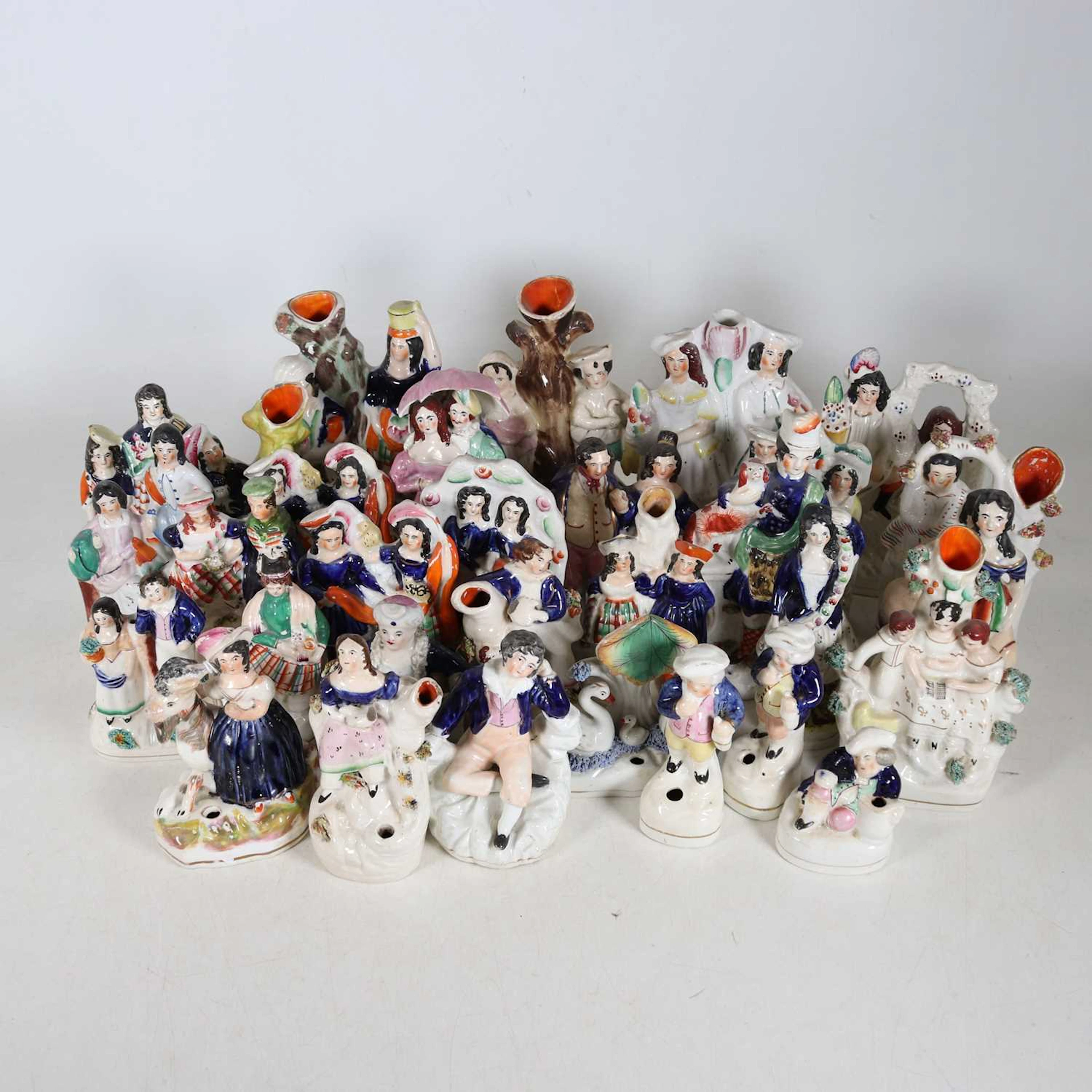 Lot 136 - A collection of Staffordshire pottery