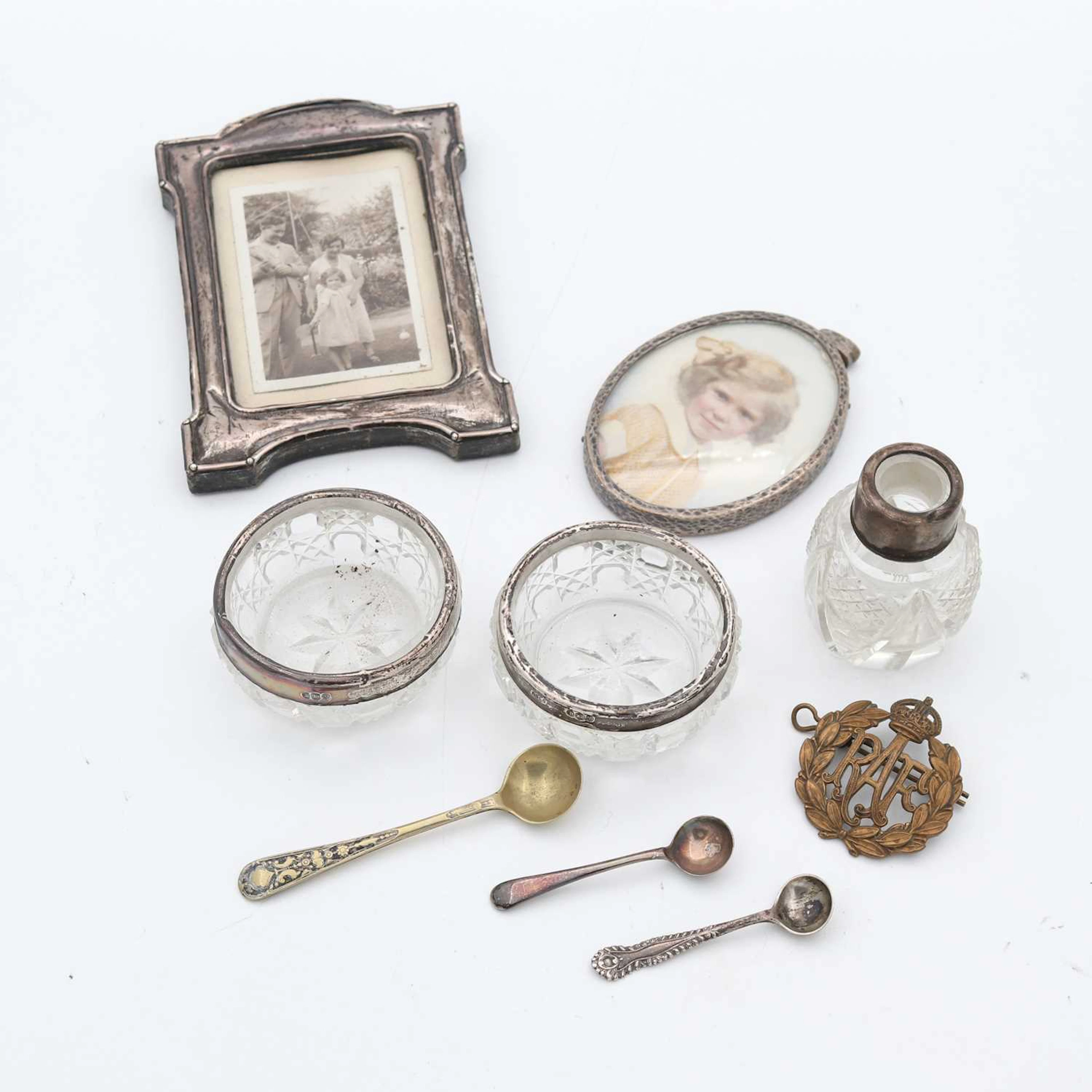 Lot 253 - A silver clad easel photograph frame, h.12cm