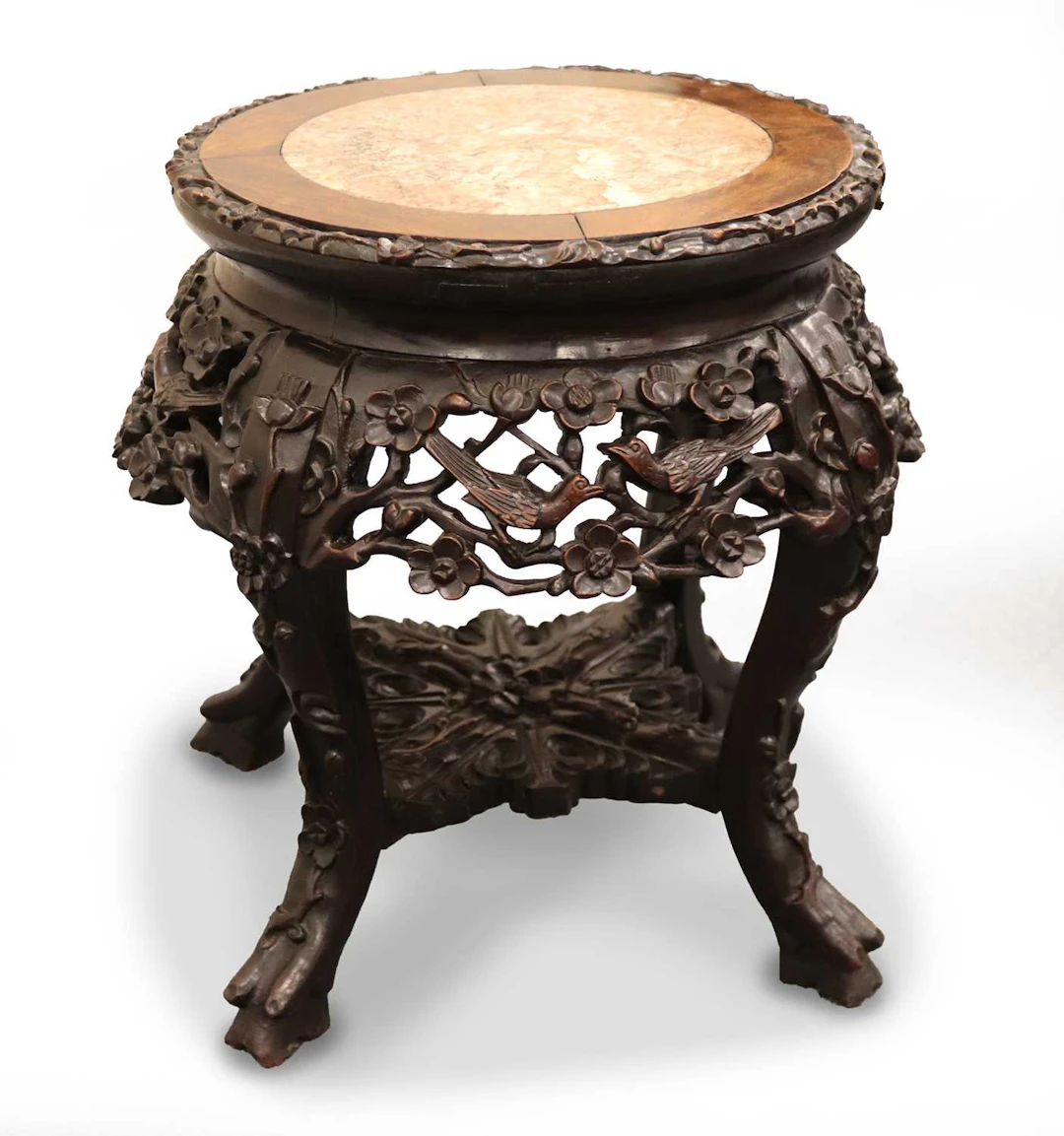 Lot 179 - A Chinese carved hardwood stool with inset
