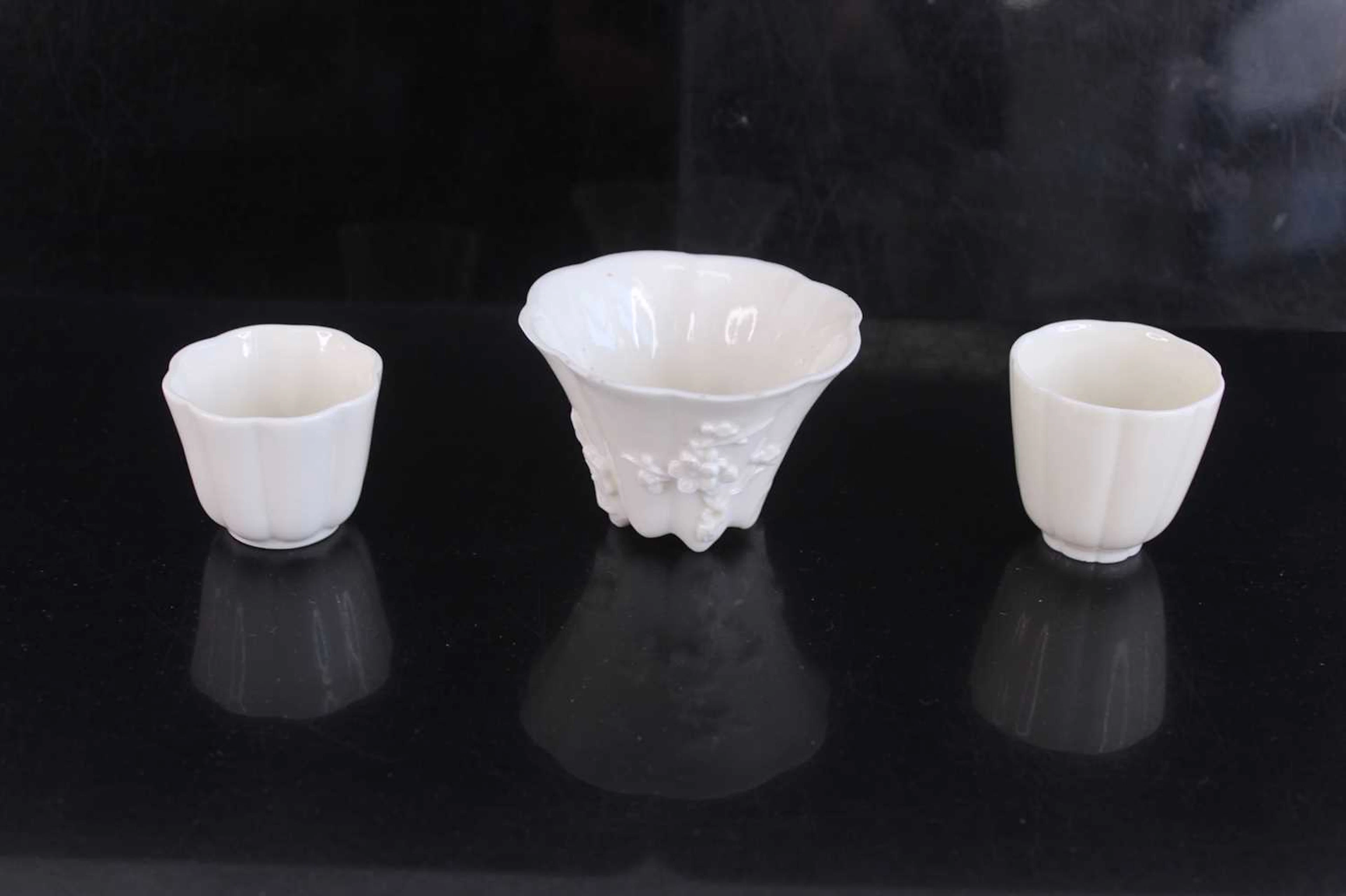 Lot 49 - Three Chinese Dehua blanc-de-Chine cups, Qing