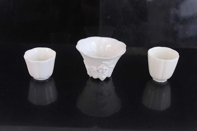 Lot 49 - Three Chinese Dehua blanc-de-Chine cups, Qing