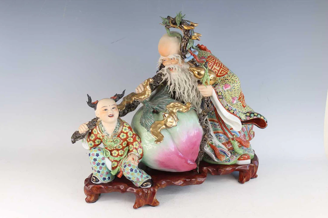 Lot 22 - A large Chinese famille rose porcelain figure