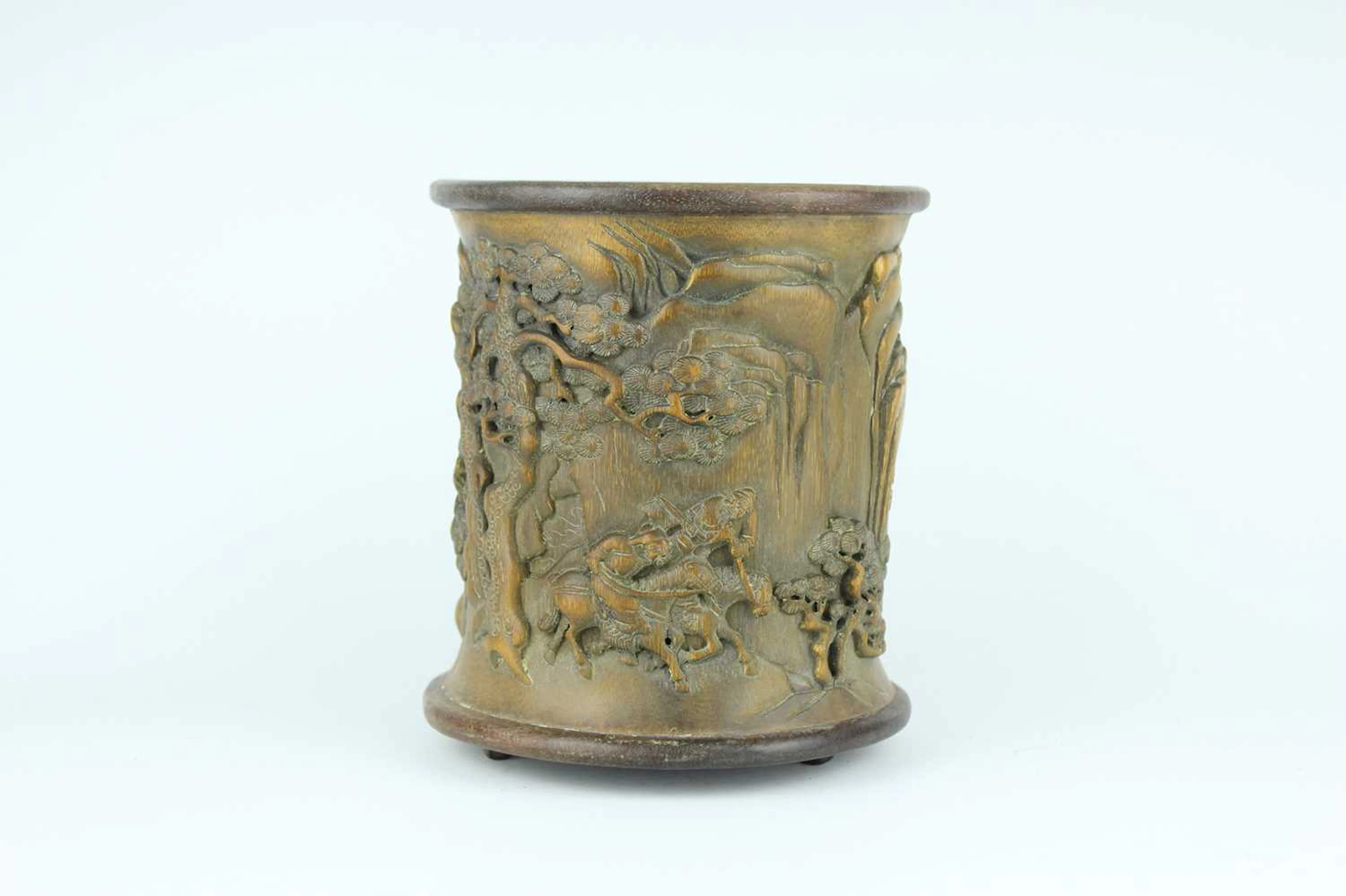 Lot 134 - A Chinese bamboo “figural” brush pot, Qing