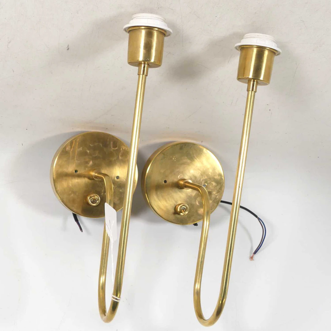 Lot 44 - A pair of contemporary brushed metal curved