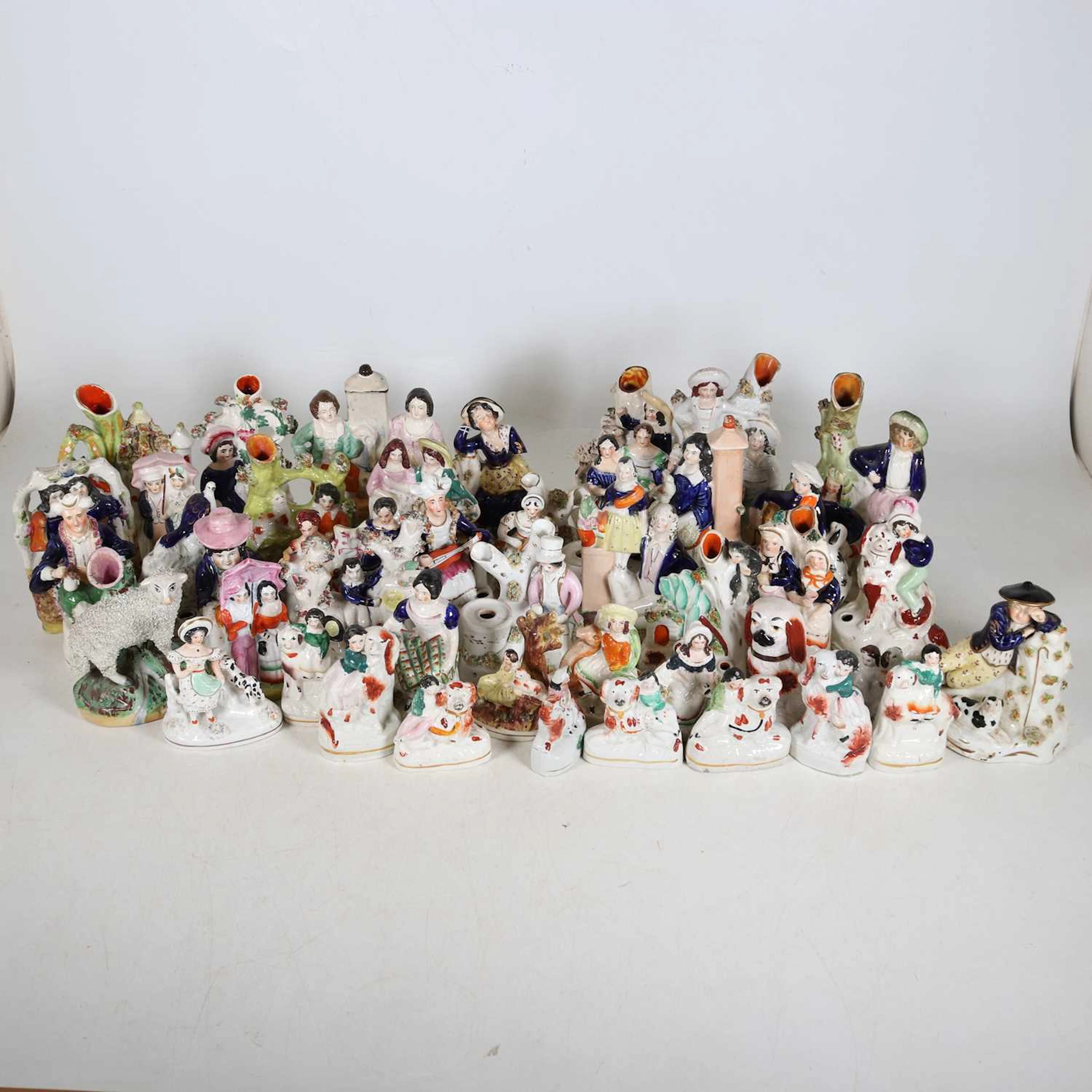 Lot 135 - A collection of Staffordshire pottery