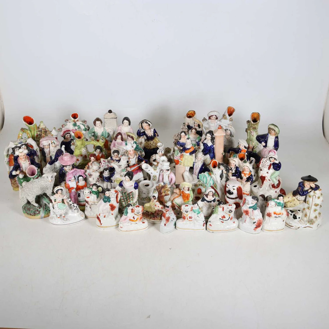 Lot 135 - A collection of Staffordshire pottery