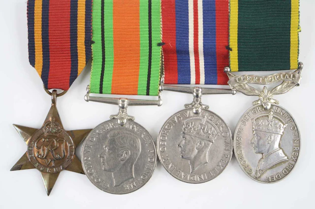 Lot 1217 - A group of four medals to include WW II