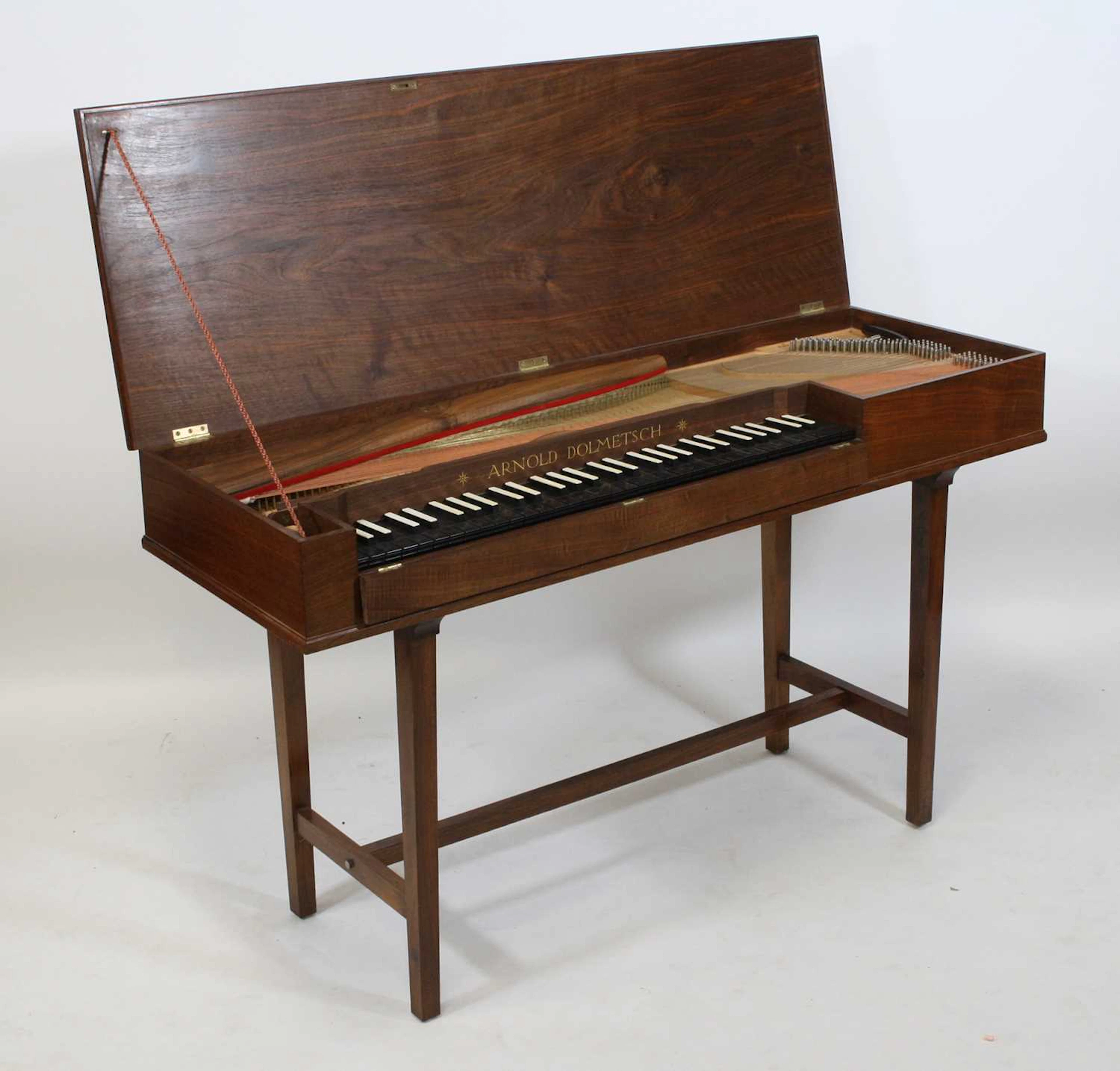 Lot 2327 - A 1970's Arnold Dolmetsch walnut cased