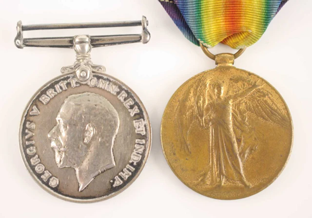Lot 1014 - A pair of WW I British War and Victory