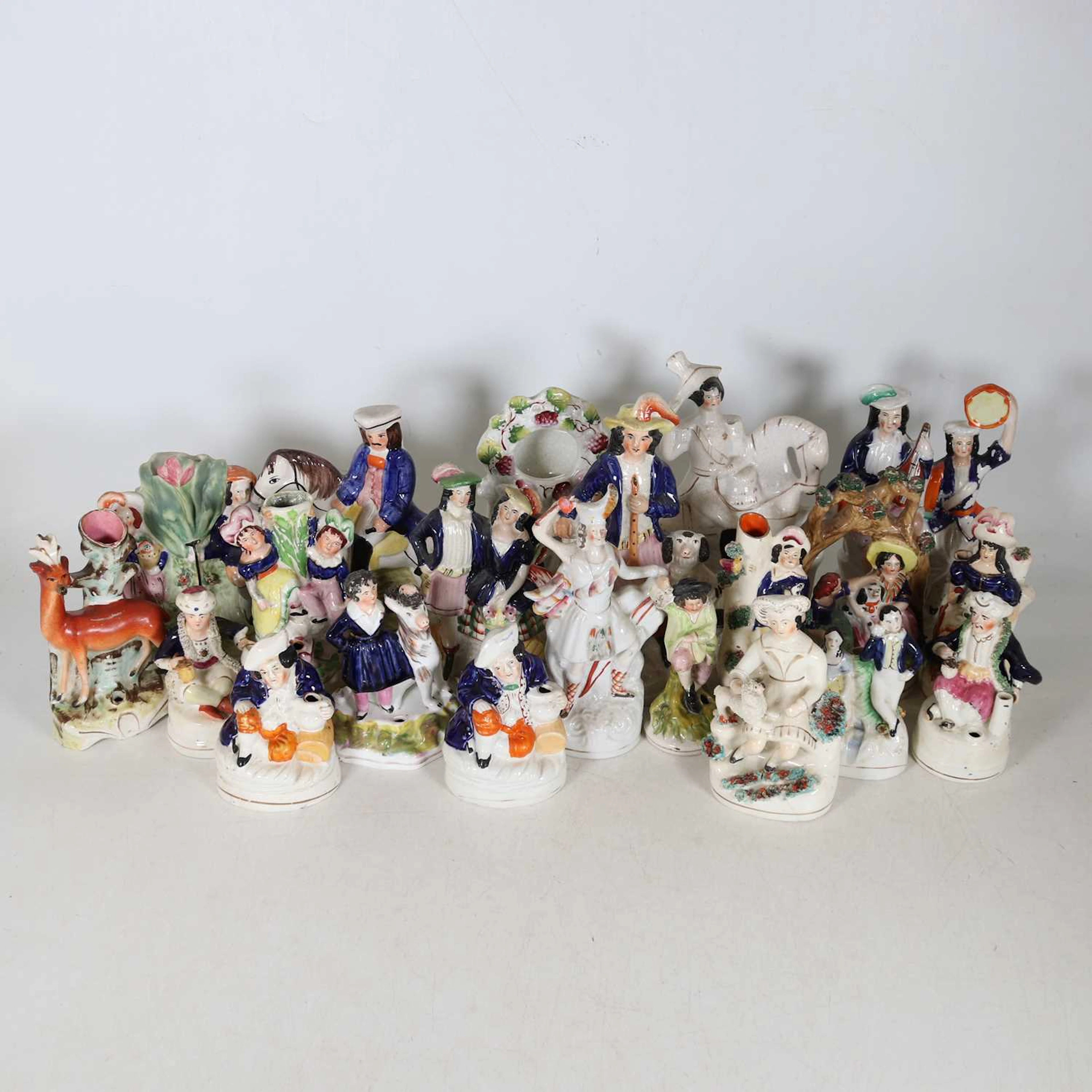 Lot 137 - A collection of Staffordshire pottery
