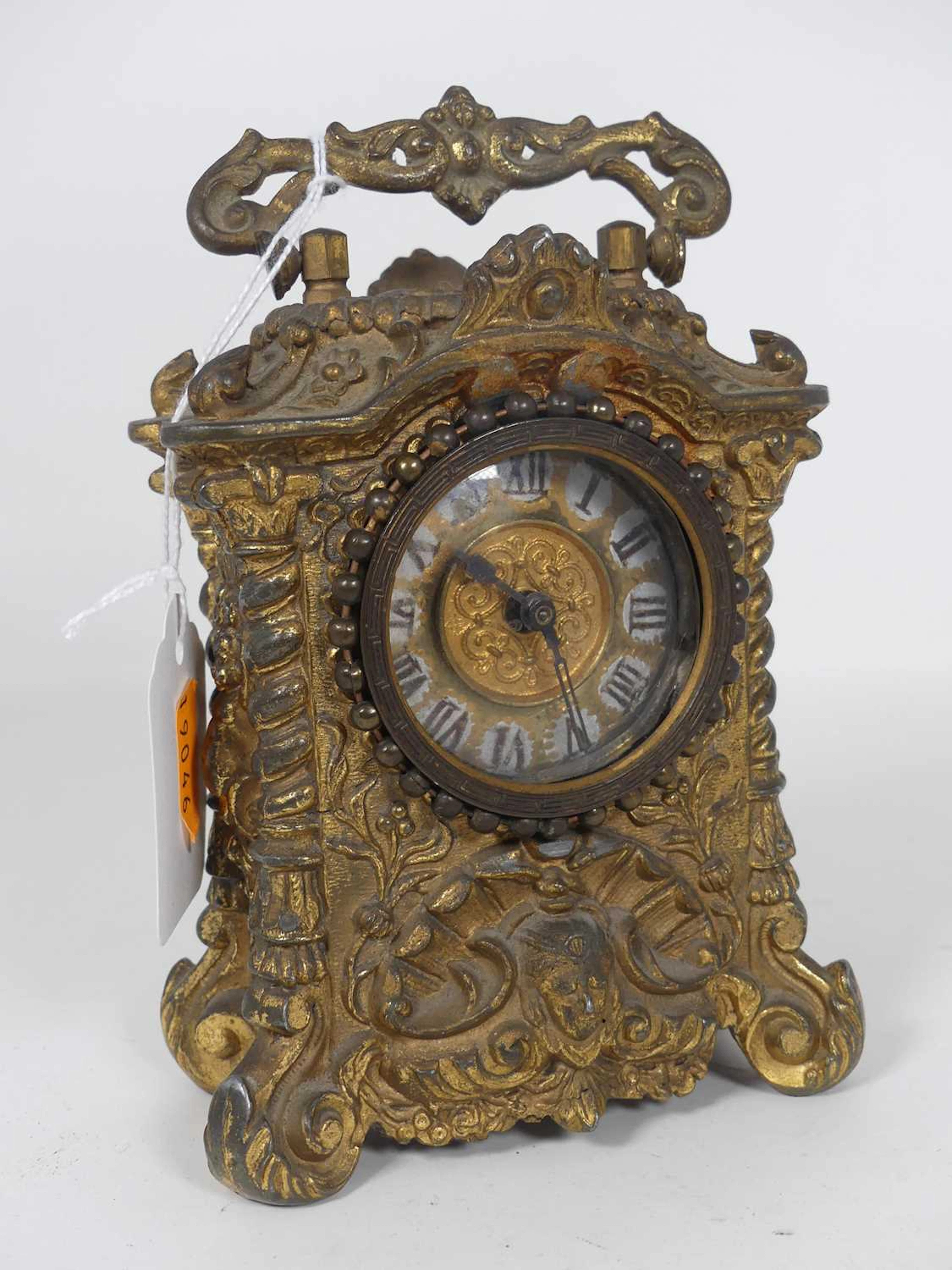 Lot 344 - A Baroque style gilt metal cased mantel