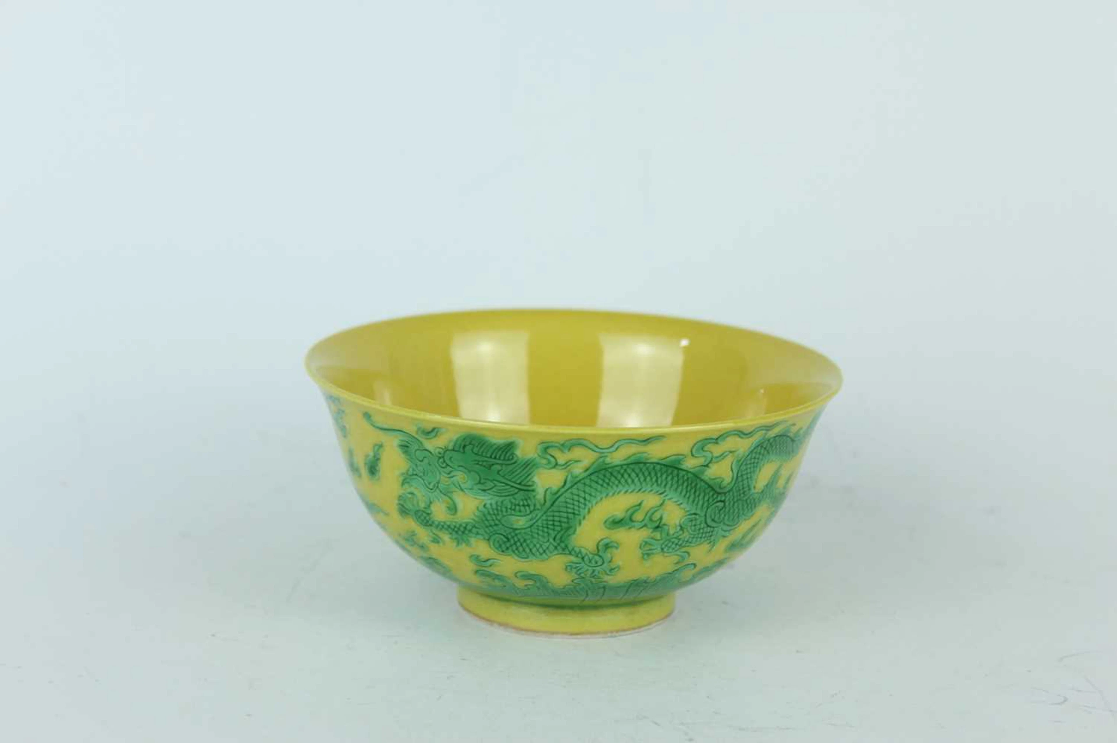 Lot 110 - A Chinese yellow-ground green-enamelled