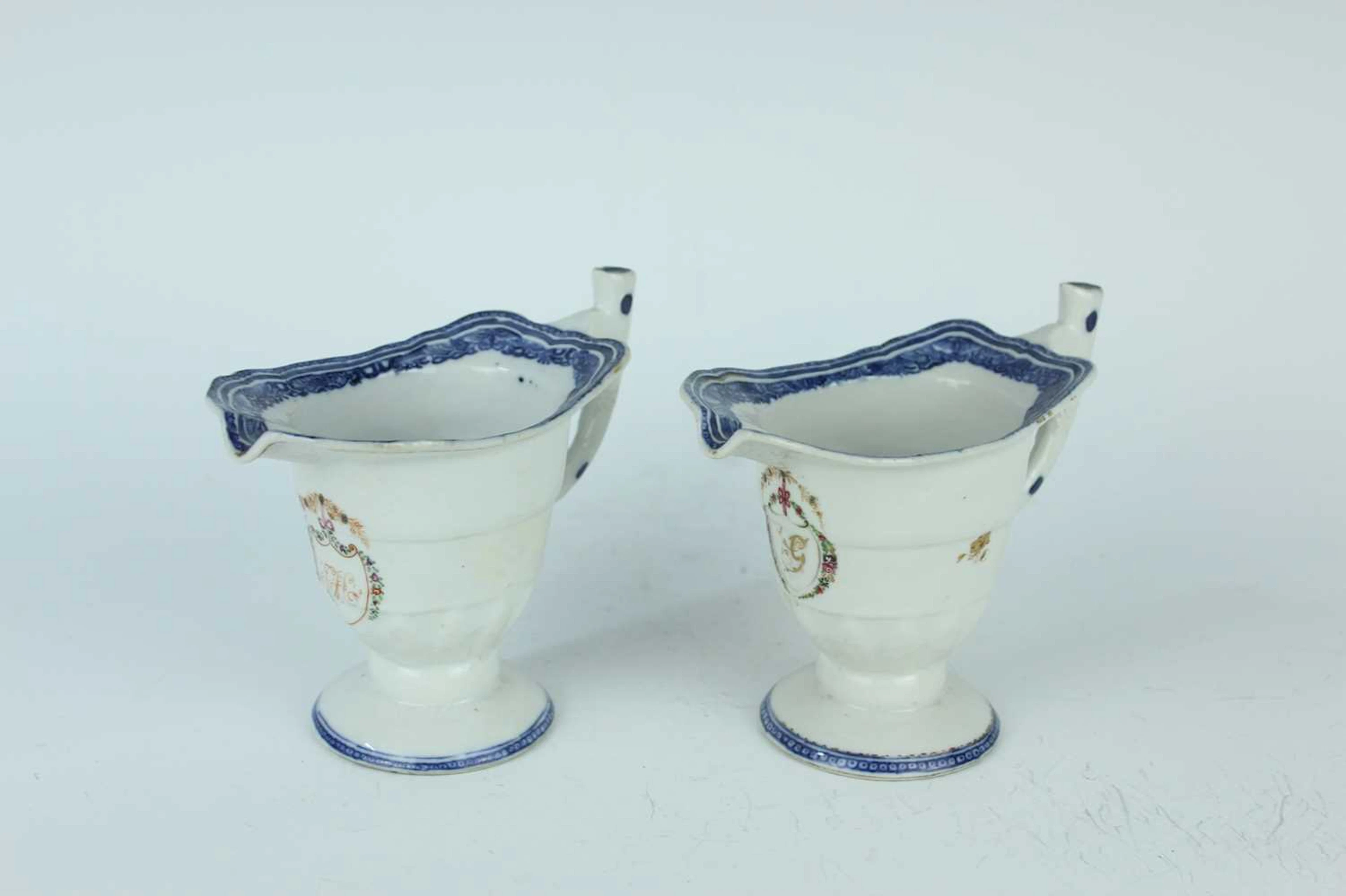 Lot 124 - A pair of Chinese export armorial porcelain