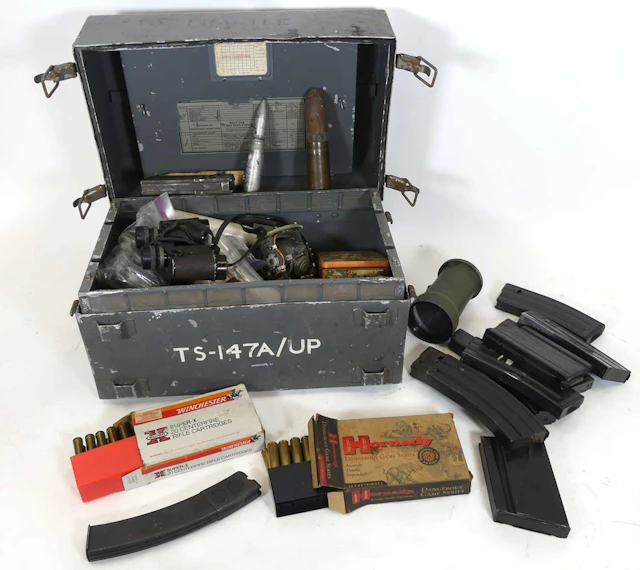 Lot 1080 - A Nato metal box containing various machine
