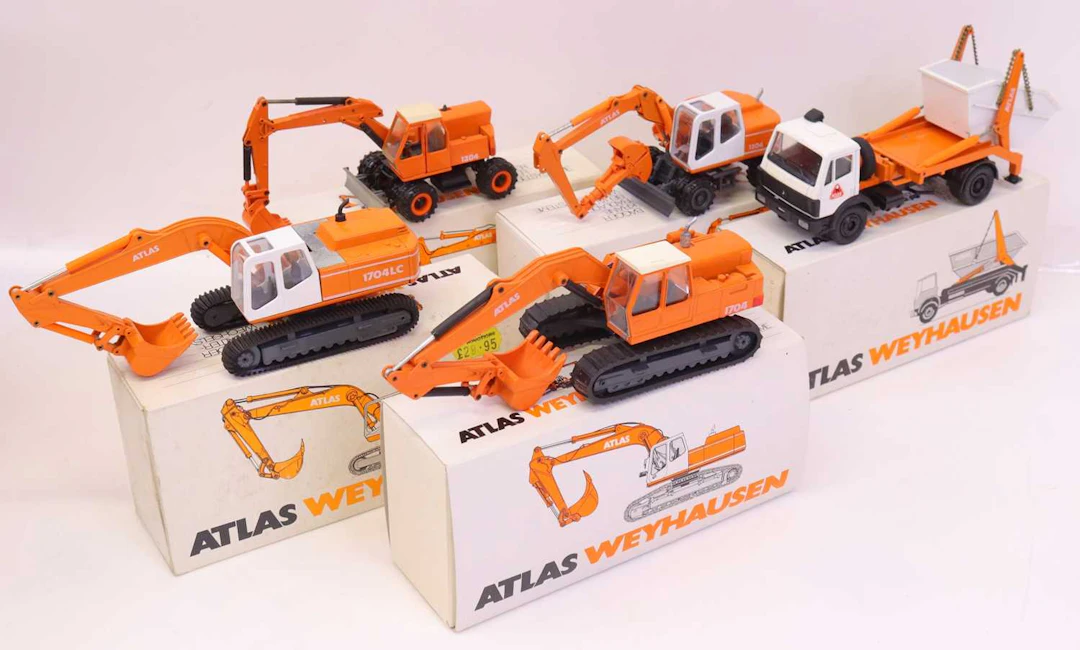 Lot 474 - A collection of five various boxed Atlas