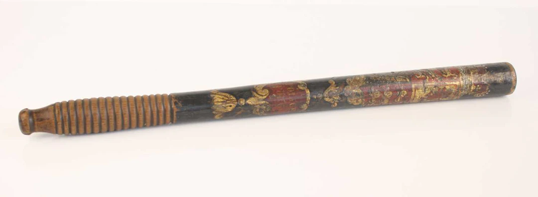 Lot 1042 - A 19th century turned wooden policeman's