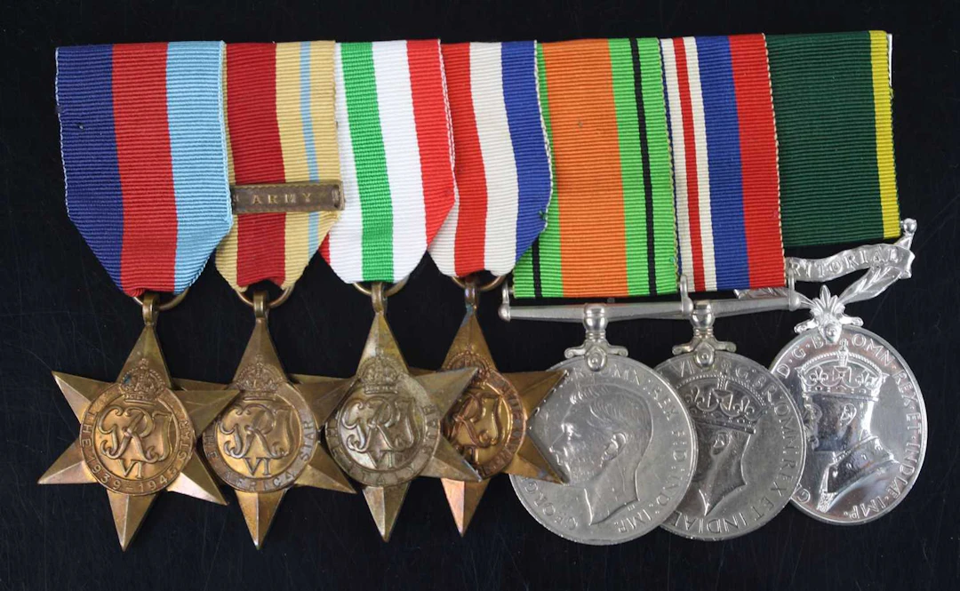 Lot 1067 - A group of seven medals to include WW II