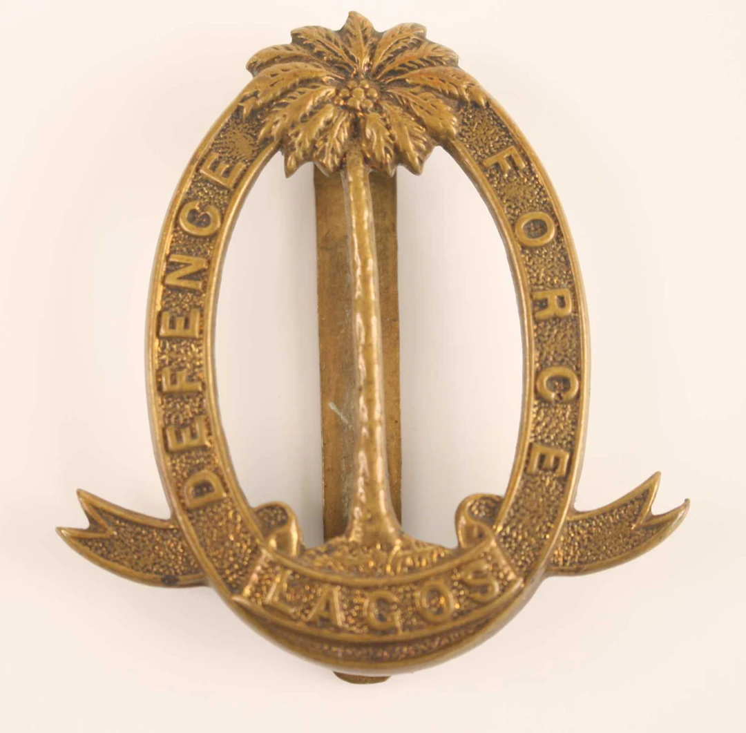 Lot 1023 - A Lagos Defence Force Officers cap badge