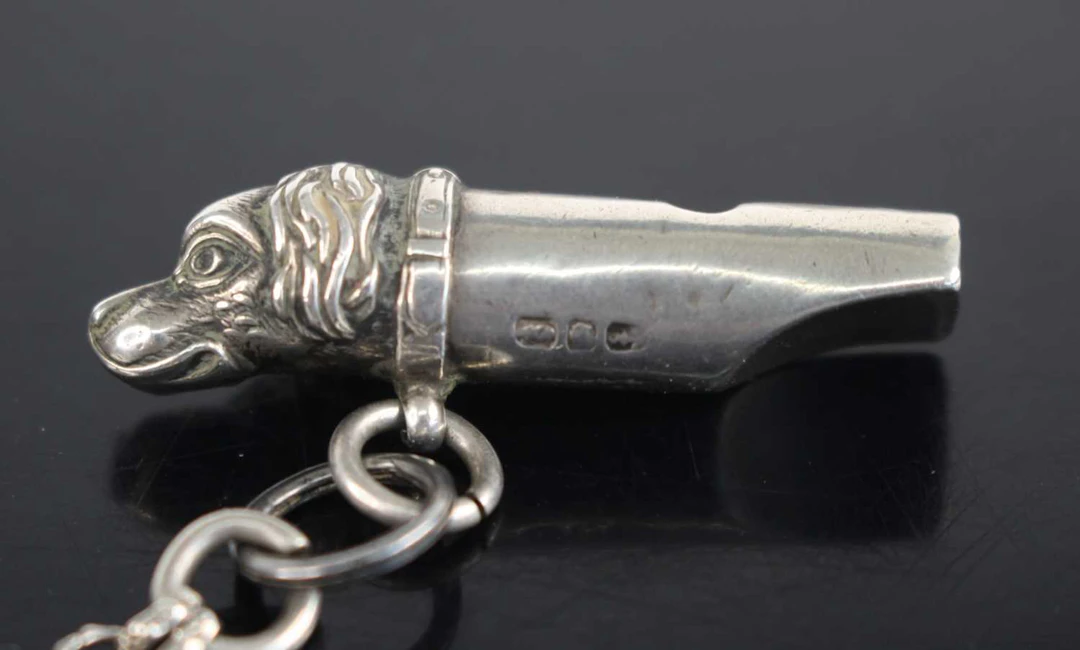 Lot 1319 - A late Victorian silver novelty whistle of