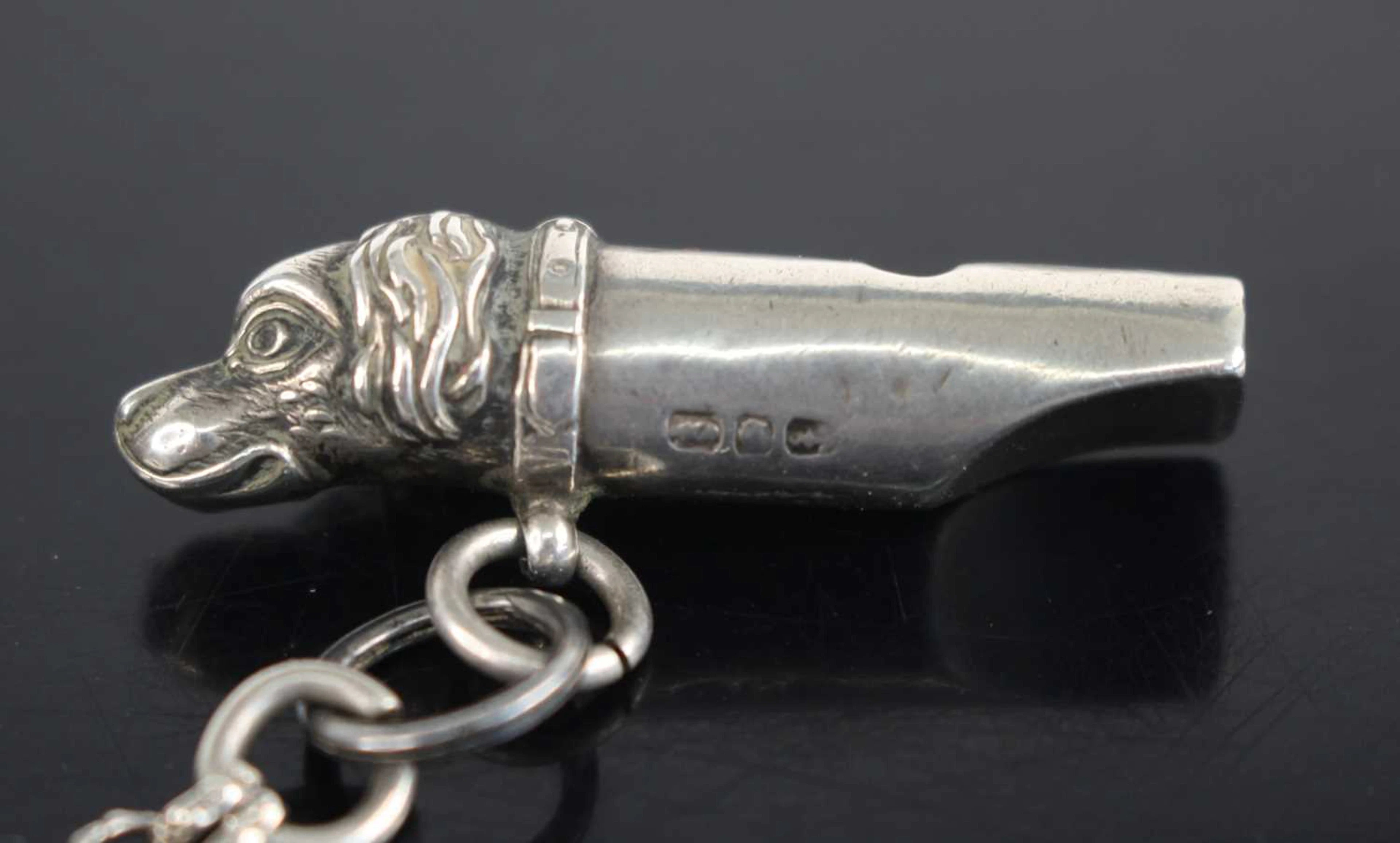 Lot 1319 - A late Victorian silver novelty whistle of