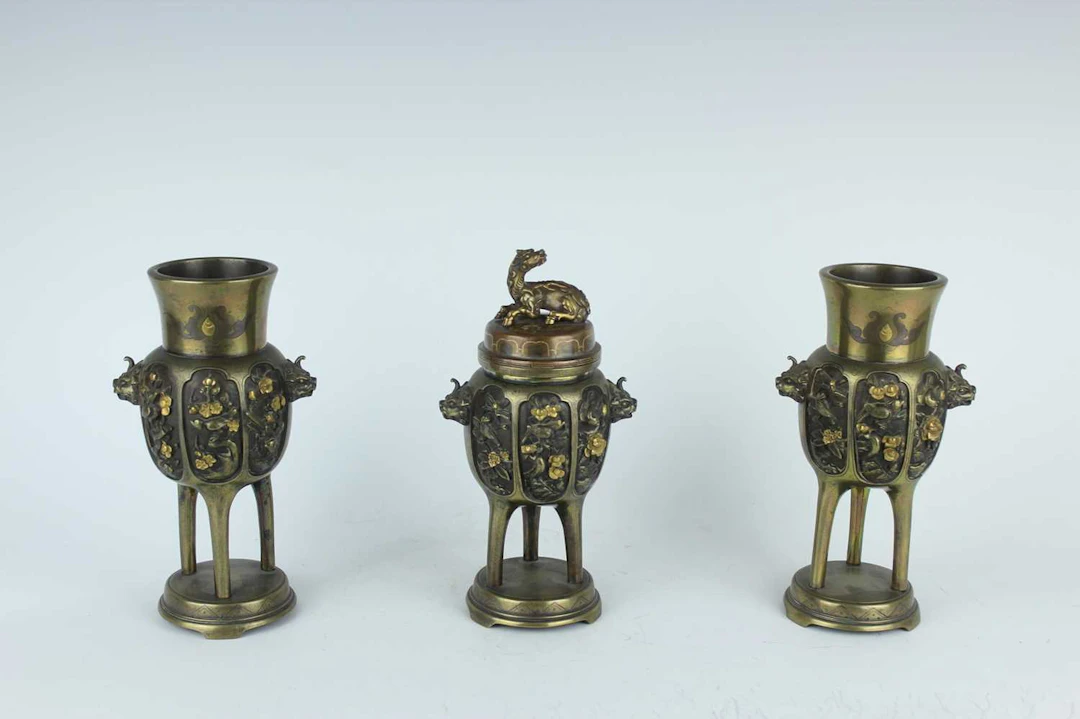 Lot 207 - A group of three Japanese silver-inlaid