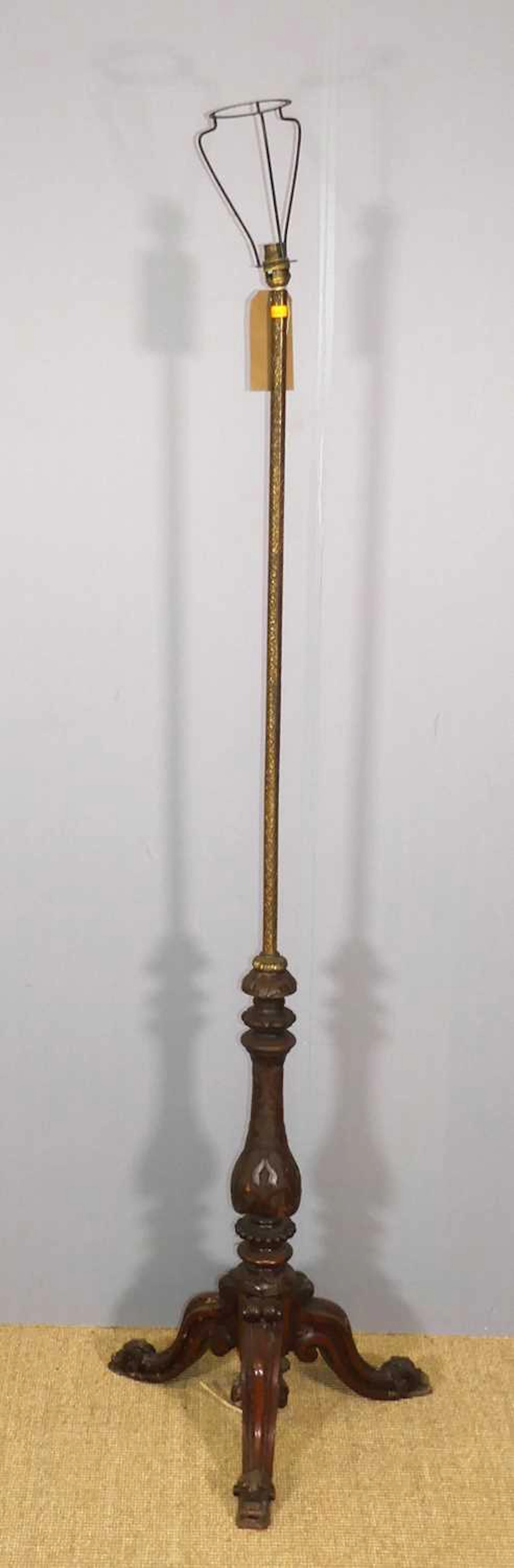 Lot 584 - A gilt metal and floral relief carved