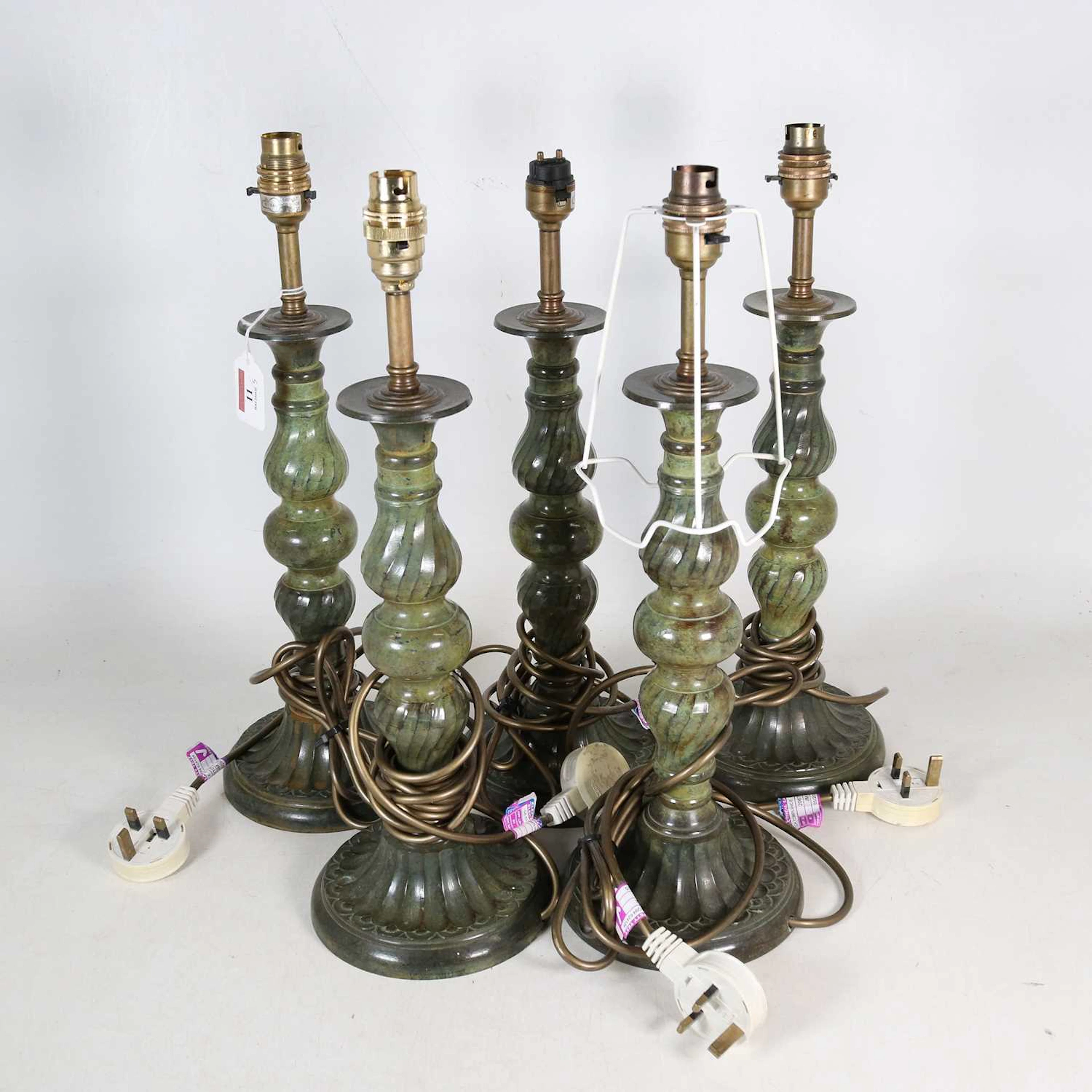 Lot 11 - A set of five contemporary verdigris metal