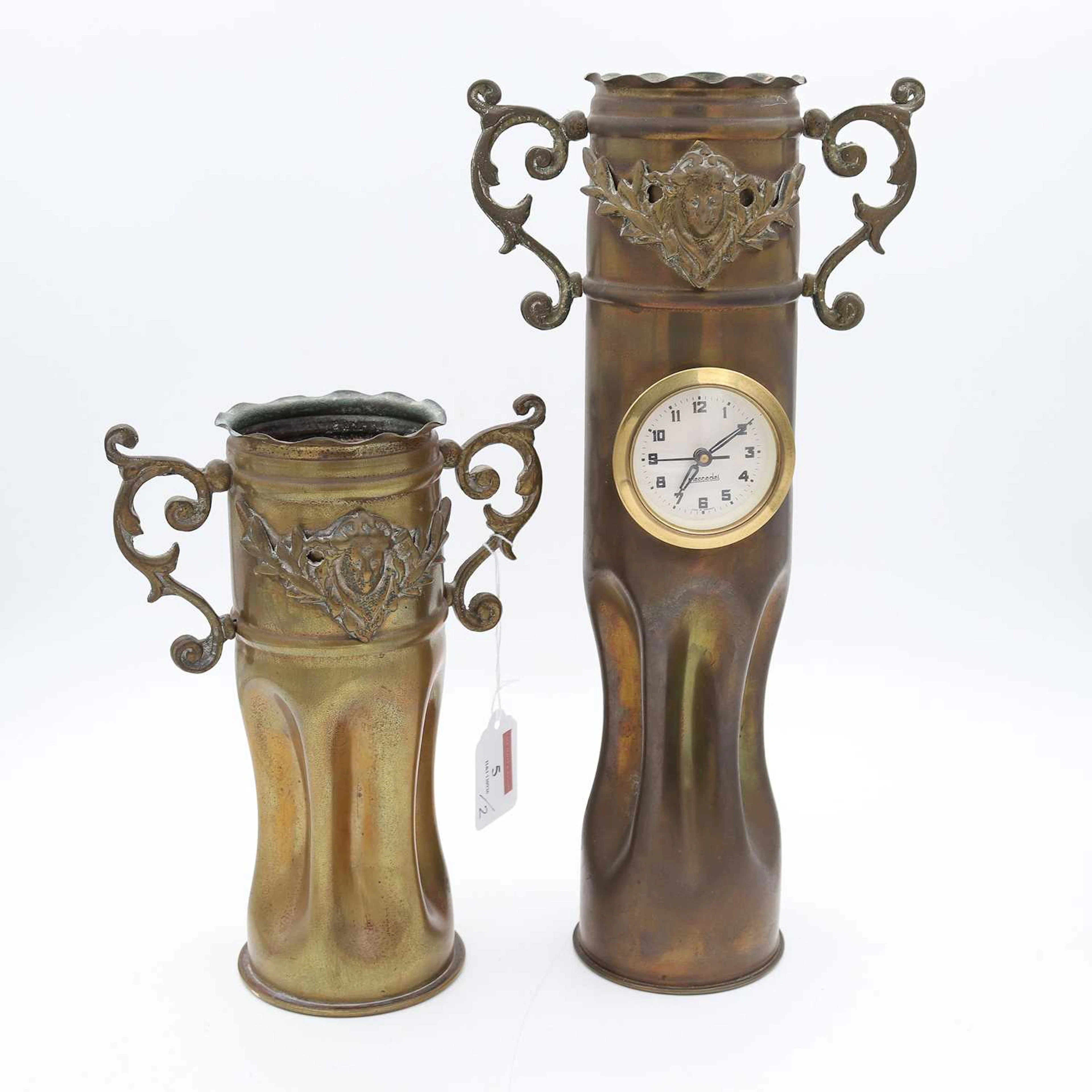 Lot 5 - A trench art shell case vase, with inset clock