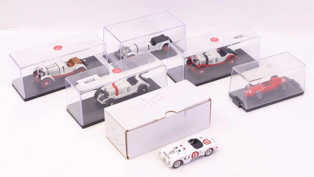 Lot 567 - small tray containing a collection of racing