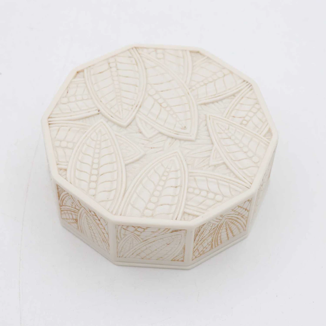 Lot 97 - An Art Deco ten-sided phenolic box, circa