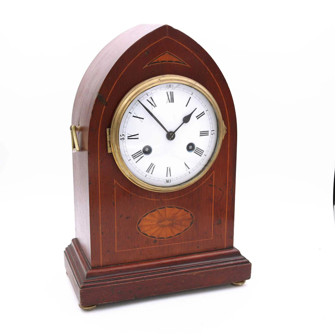 Lot 1 - A late 19th century walnut cased mantel clock