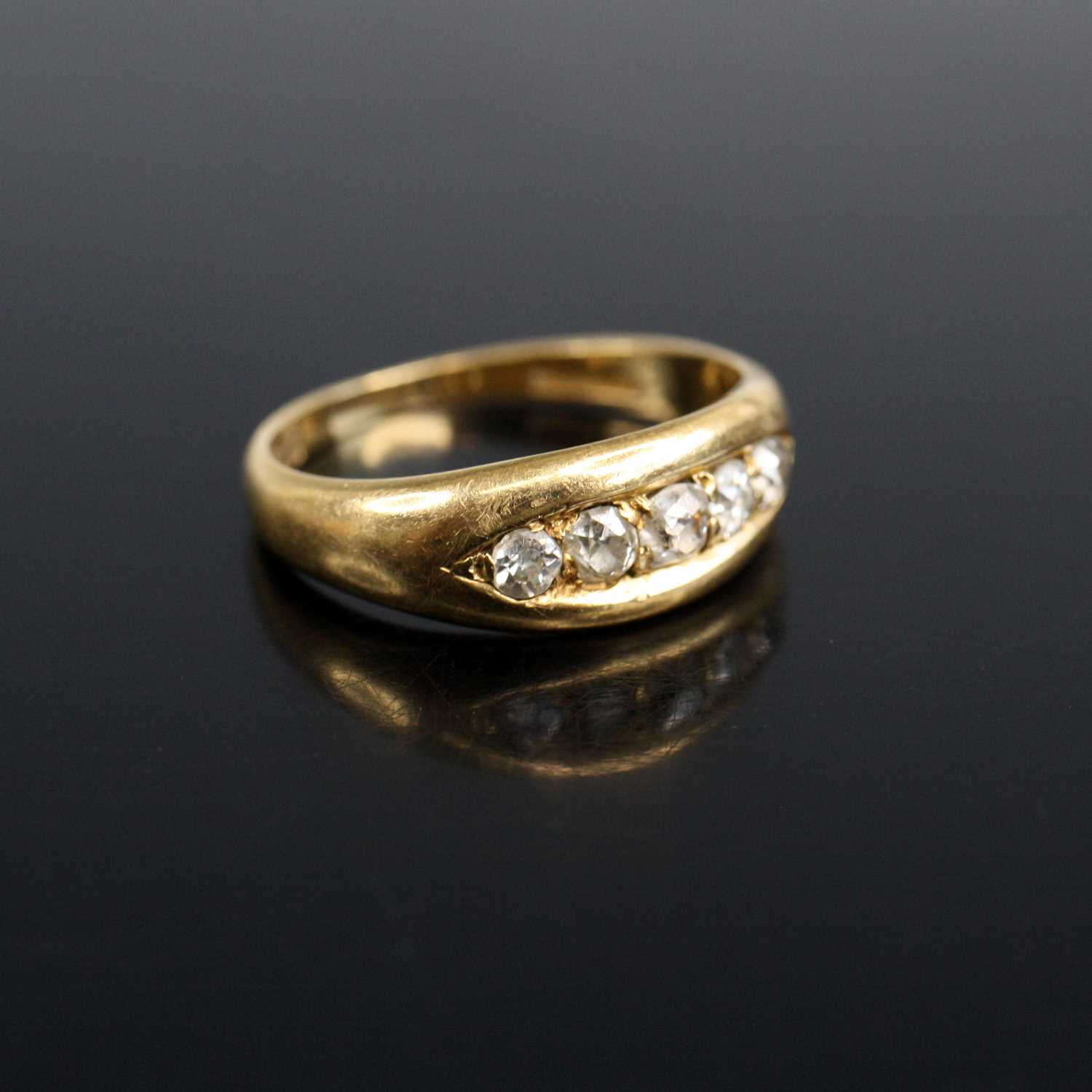 Lot 2006 - An Edwardian 18ct yellow gold diamond half