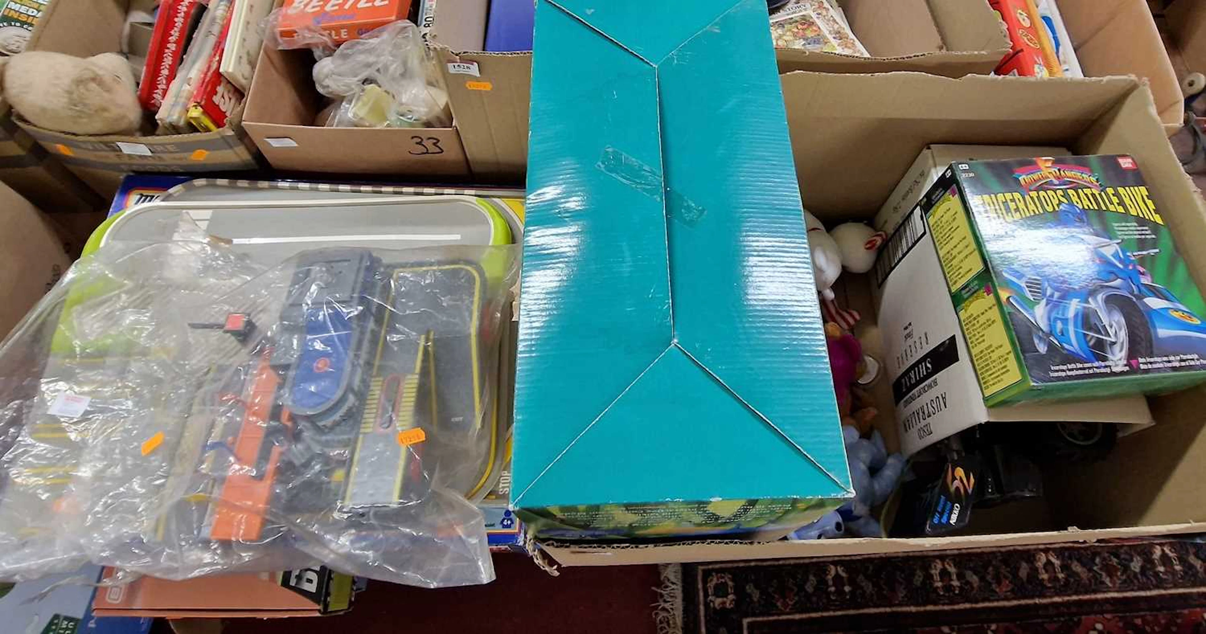 Lot 1527 - A collection of interactive toys and board