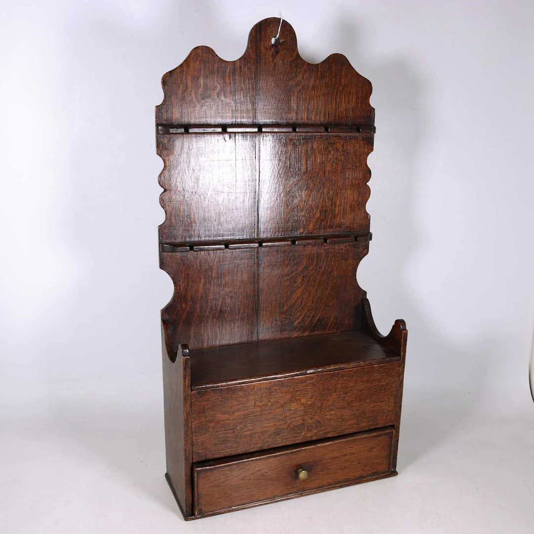 Lot 8 - A Welsh oak spoon rack, 18th century and later