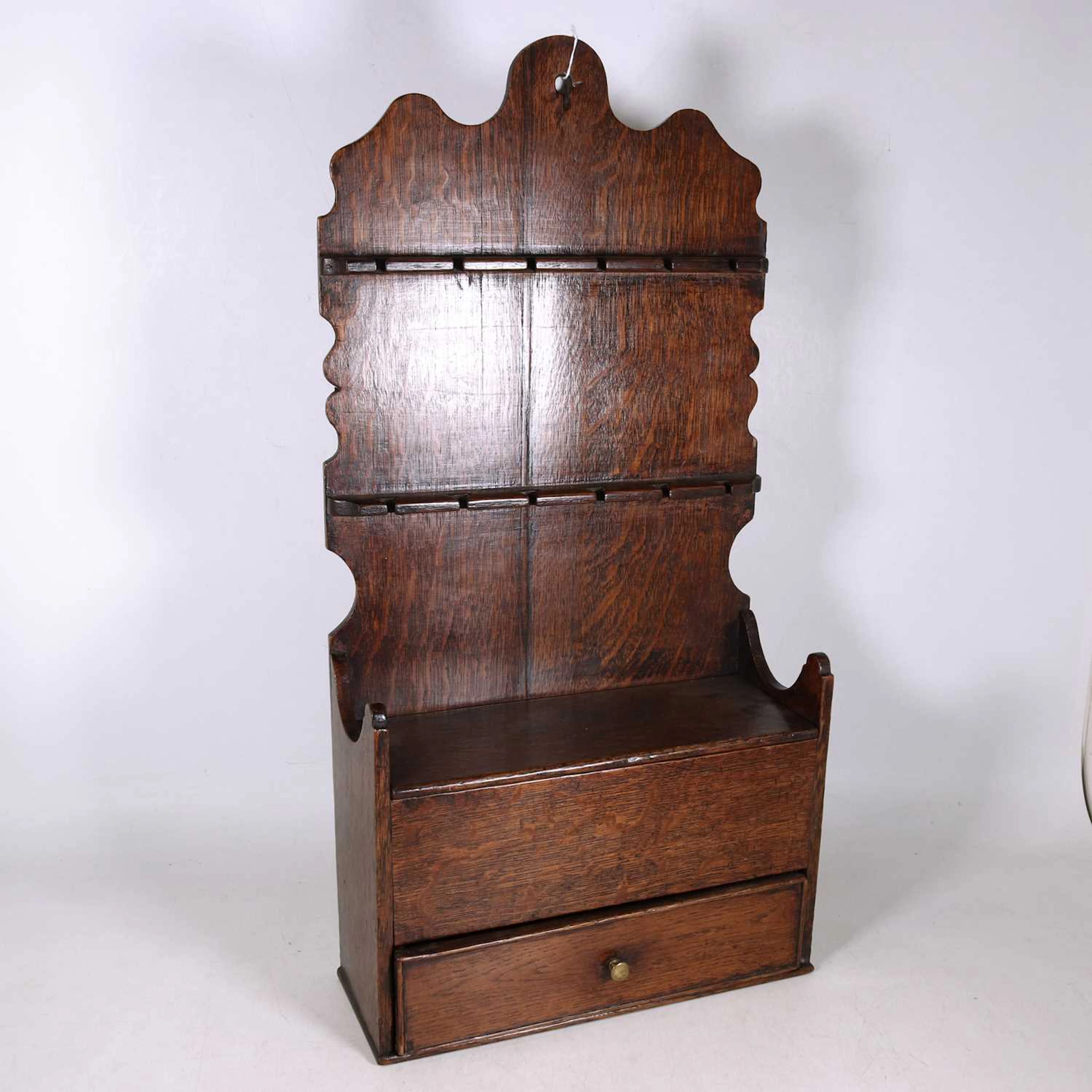 Lot 8 - A Welsh oak spoon rack, 18th century and later