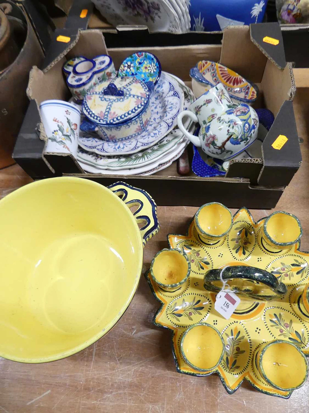 Lot 156 - A collection of Quimper pottery, to include