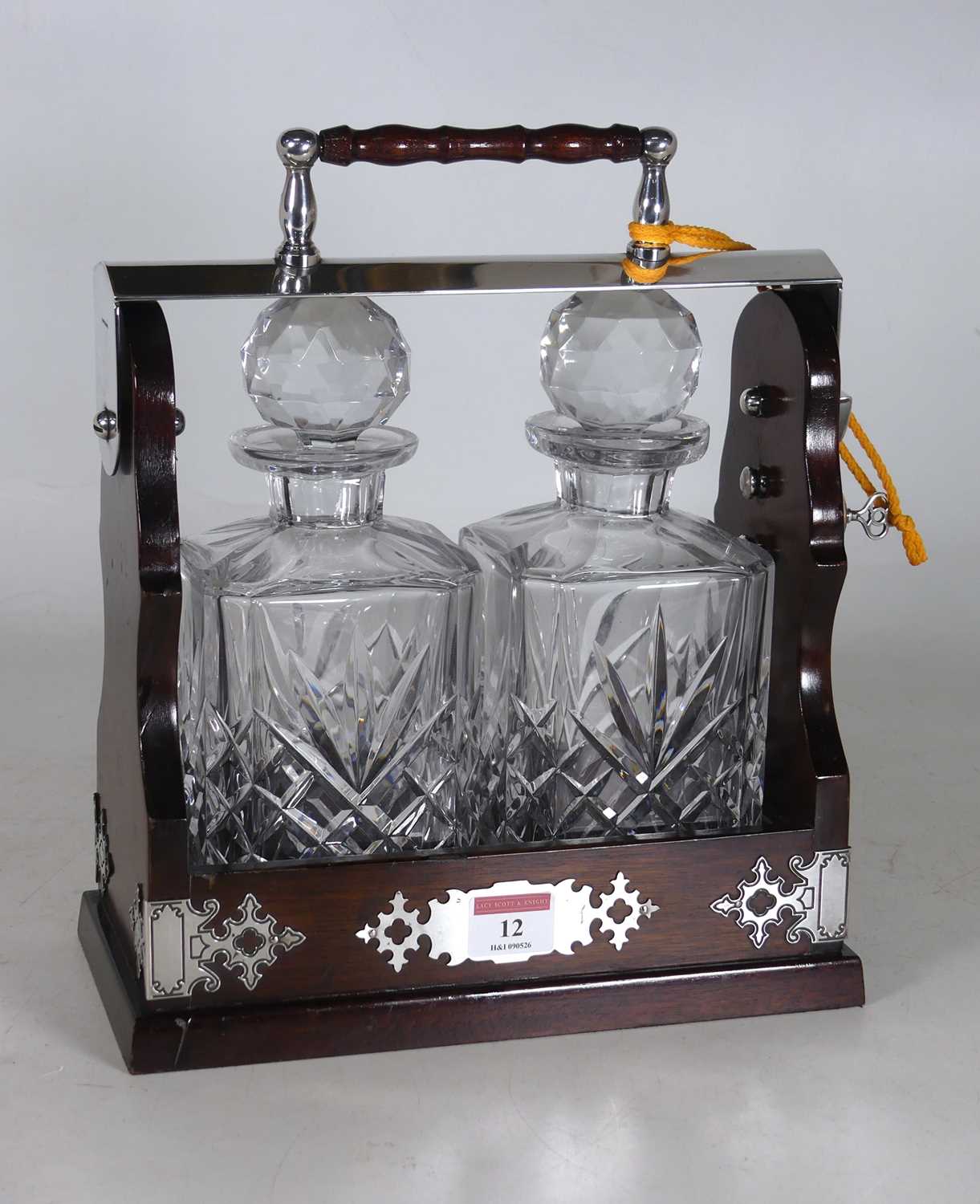 Lot 12 - A reproduction mahogany and silver plated two-