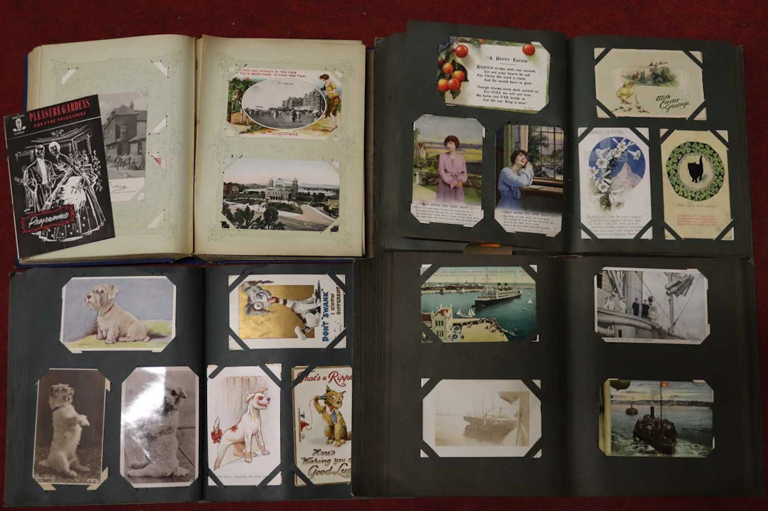 Lot 200 - Four postcard albums, early 20th century and